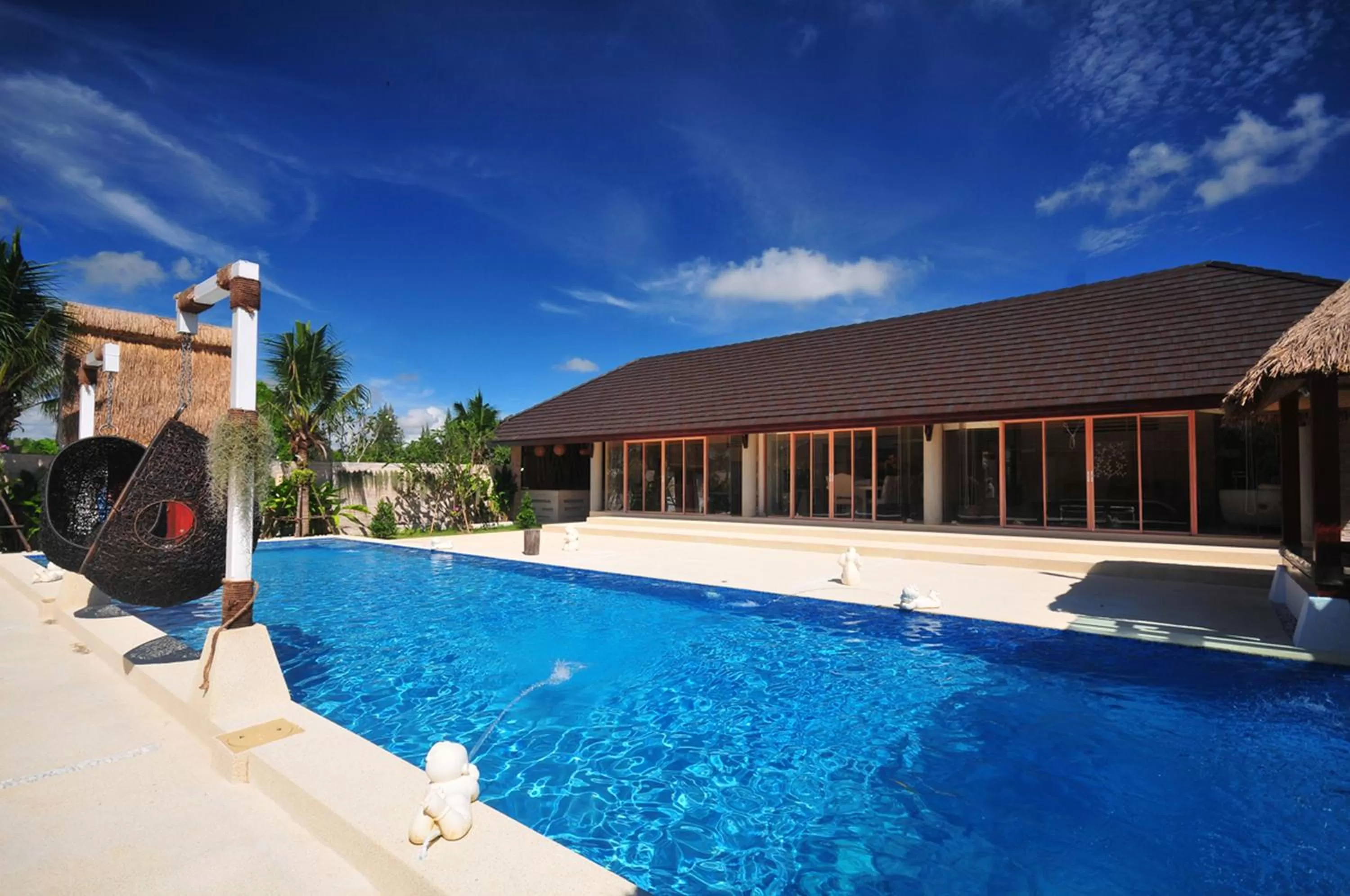 Swimming pool in Dhevan Dara Resort & Spa Hua Hin - Pool Villa