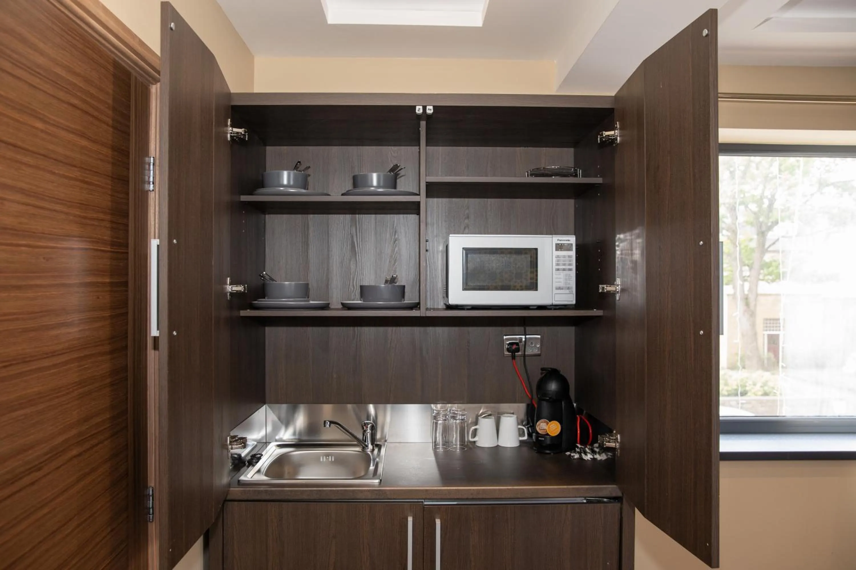 Kitchen or kitchenette in Grainger Apartments