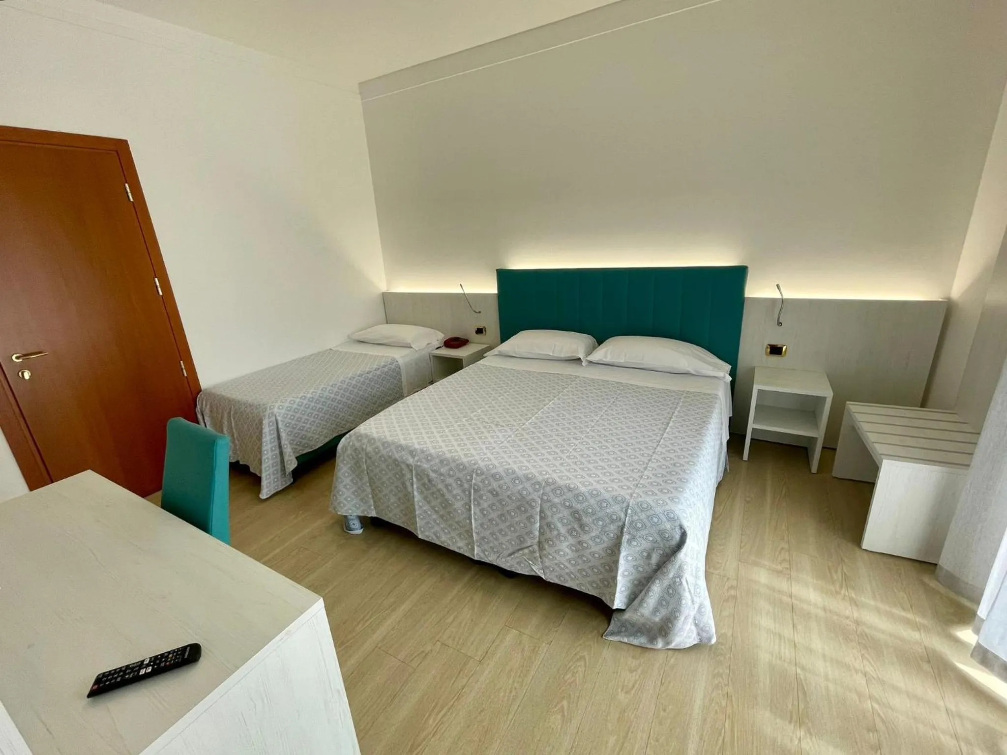 Bed in Hotel Corallo