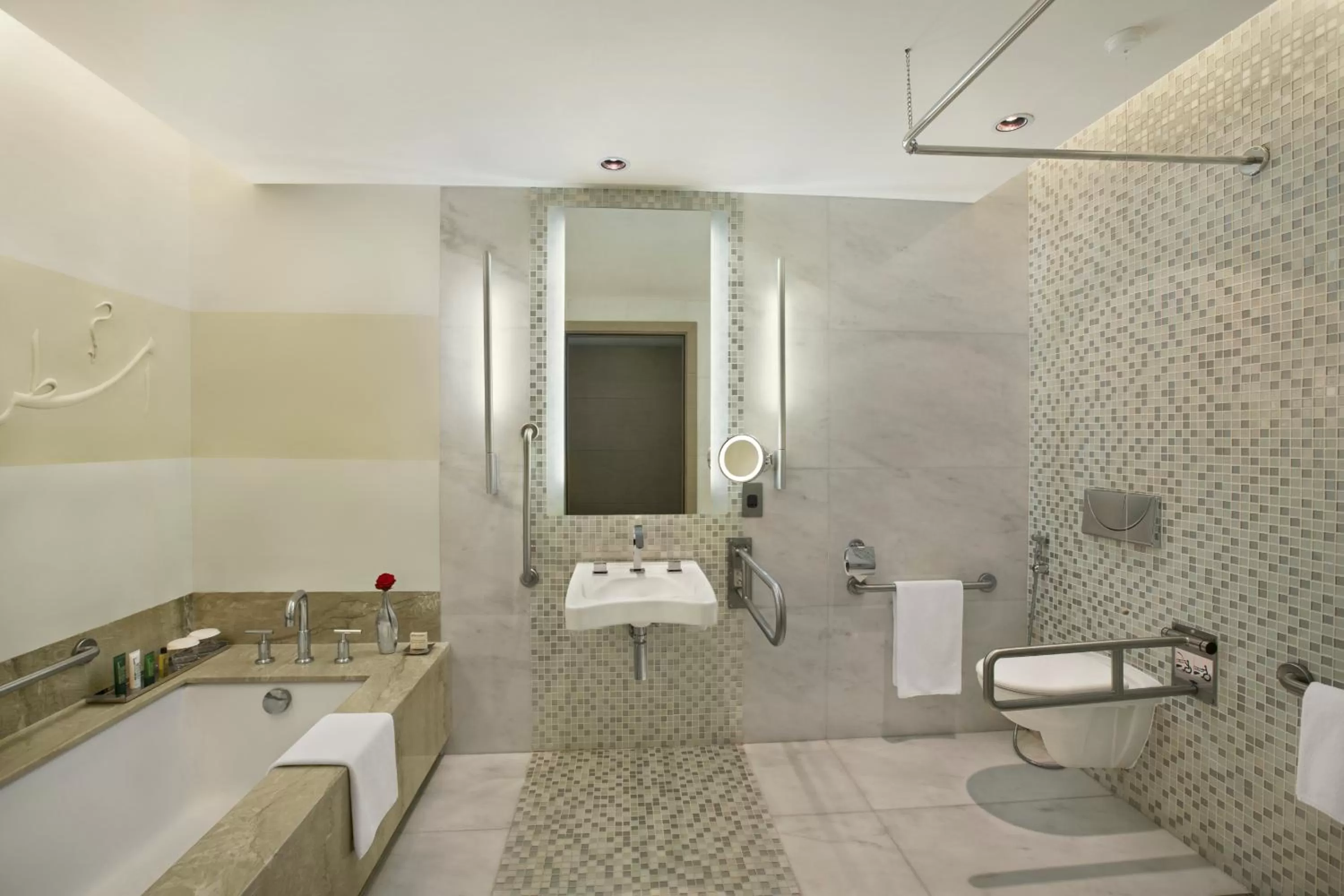 Bathroom in Millennium Al Rawdah Hotel