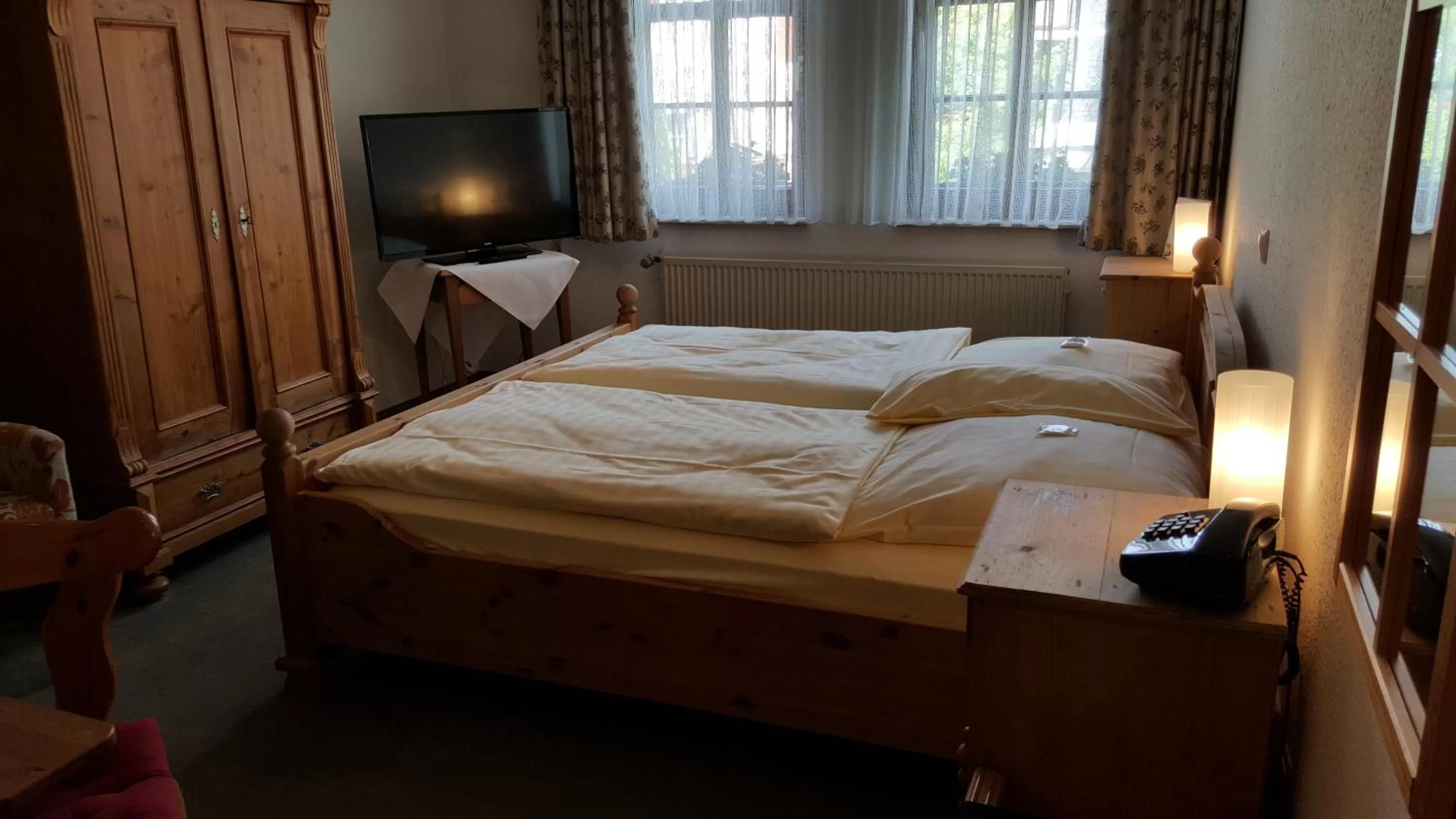 Photo of the whole room, Bed in Hotel Goldflair am Rathaus