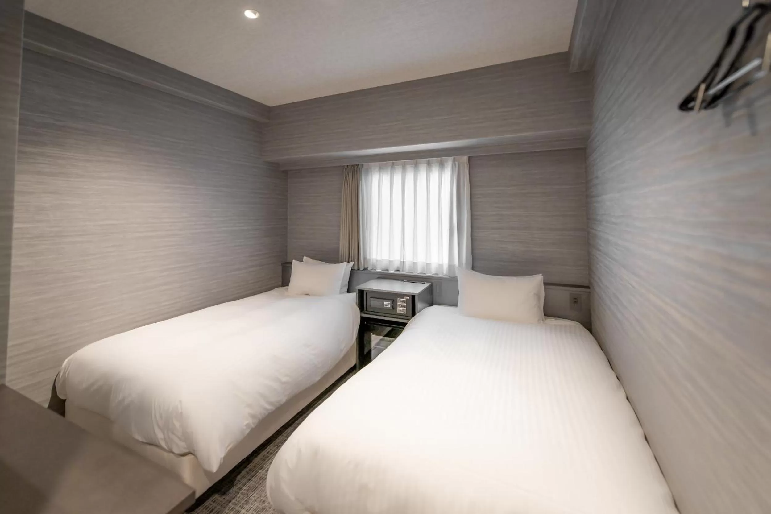 Photo of the whole room, Bed in EN HOTEL Hakata