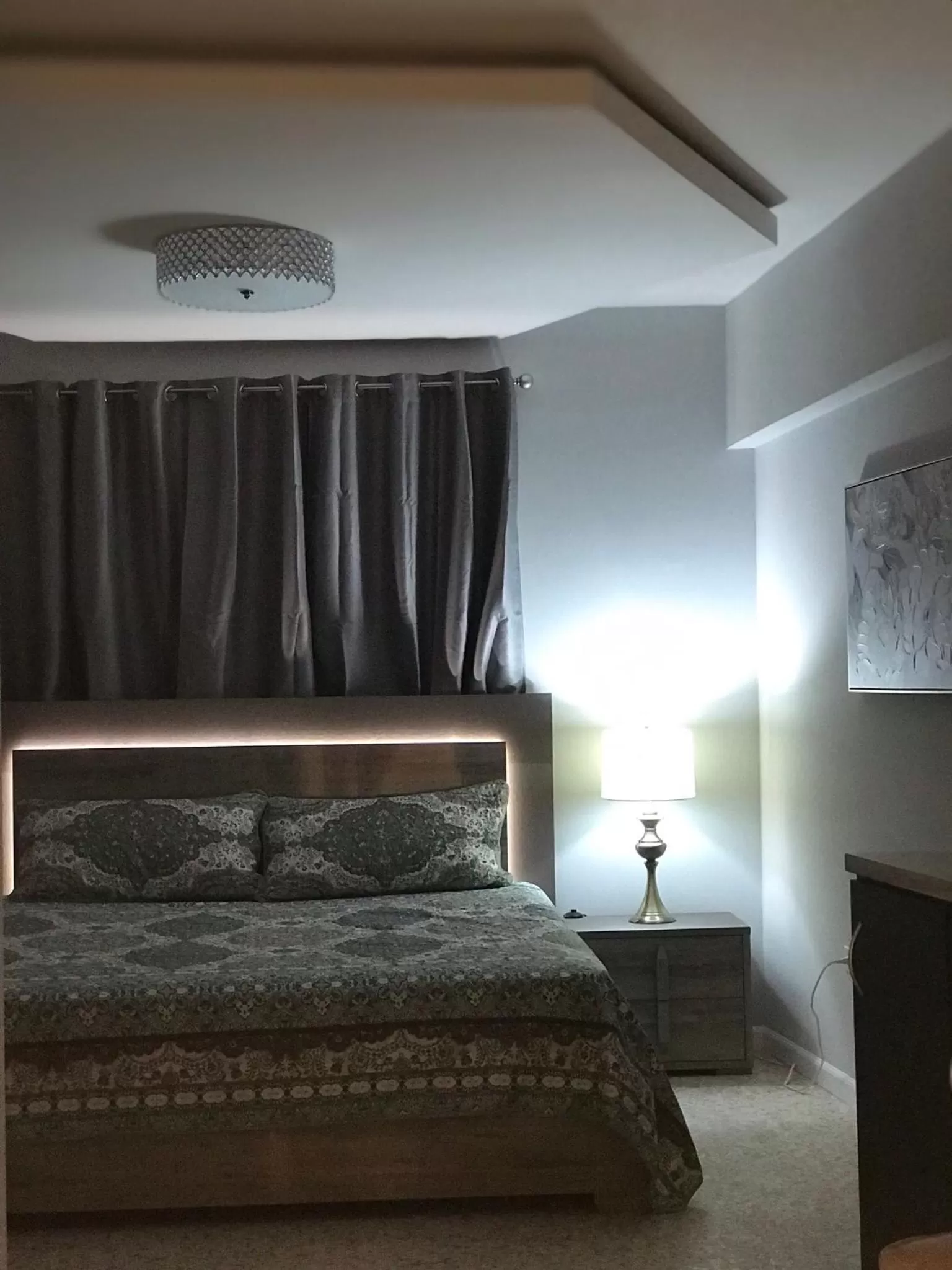 Bed in Itza-Bella Suites