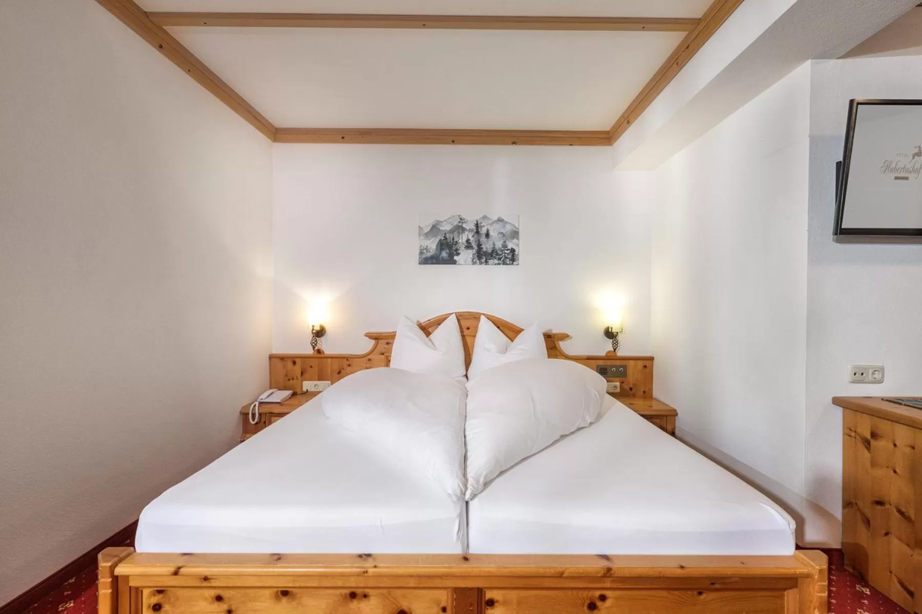 Bed in Hotel Hubertushof