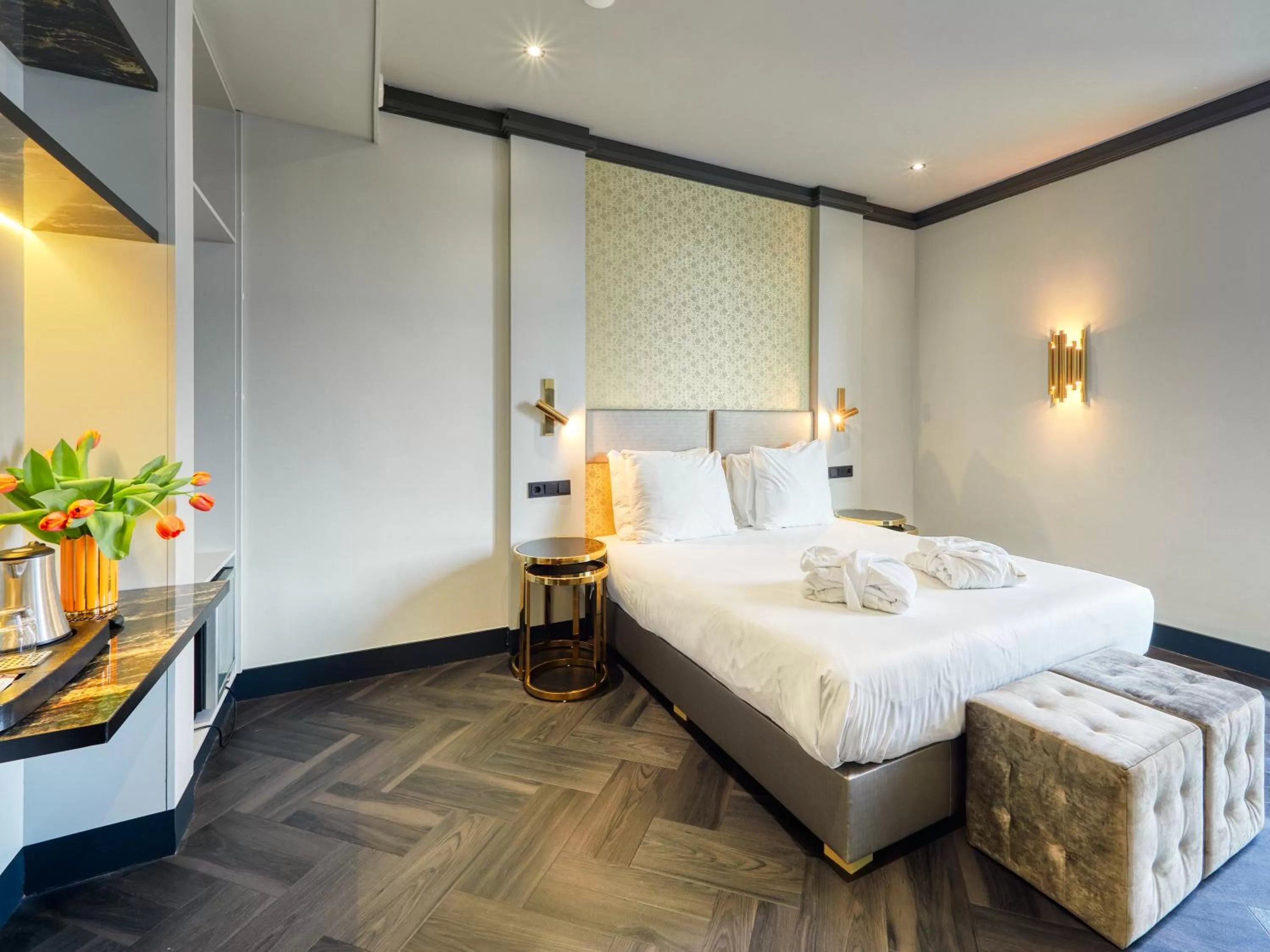 Bed in Triple G Hotels