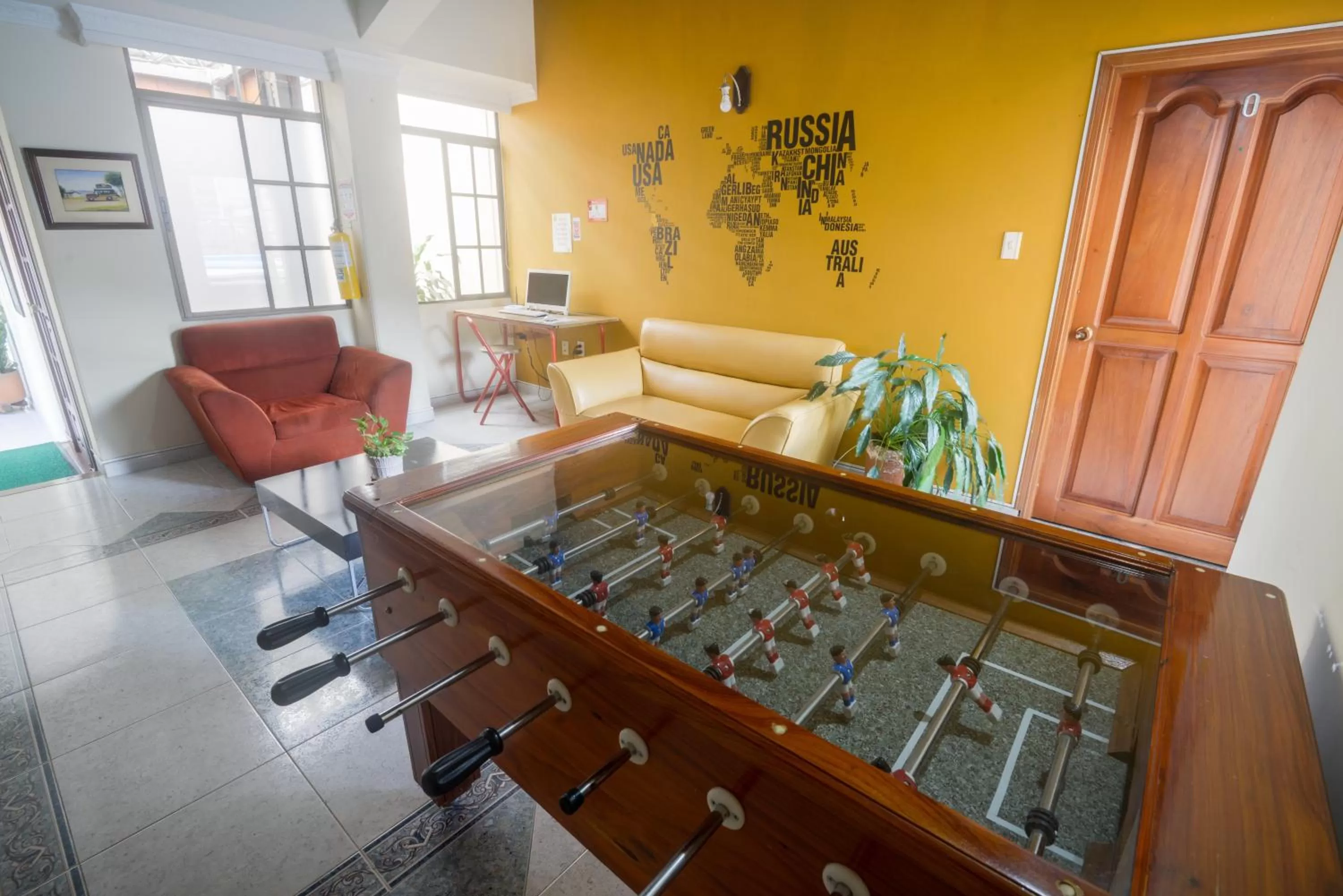 Communal lounge/ TV room in Sam'S VIP Hostel San Gil