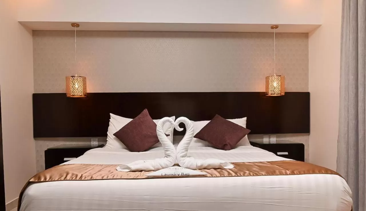 Bed in The Artisan Hotel-Suits