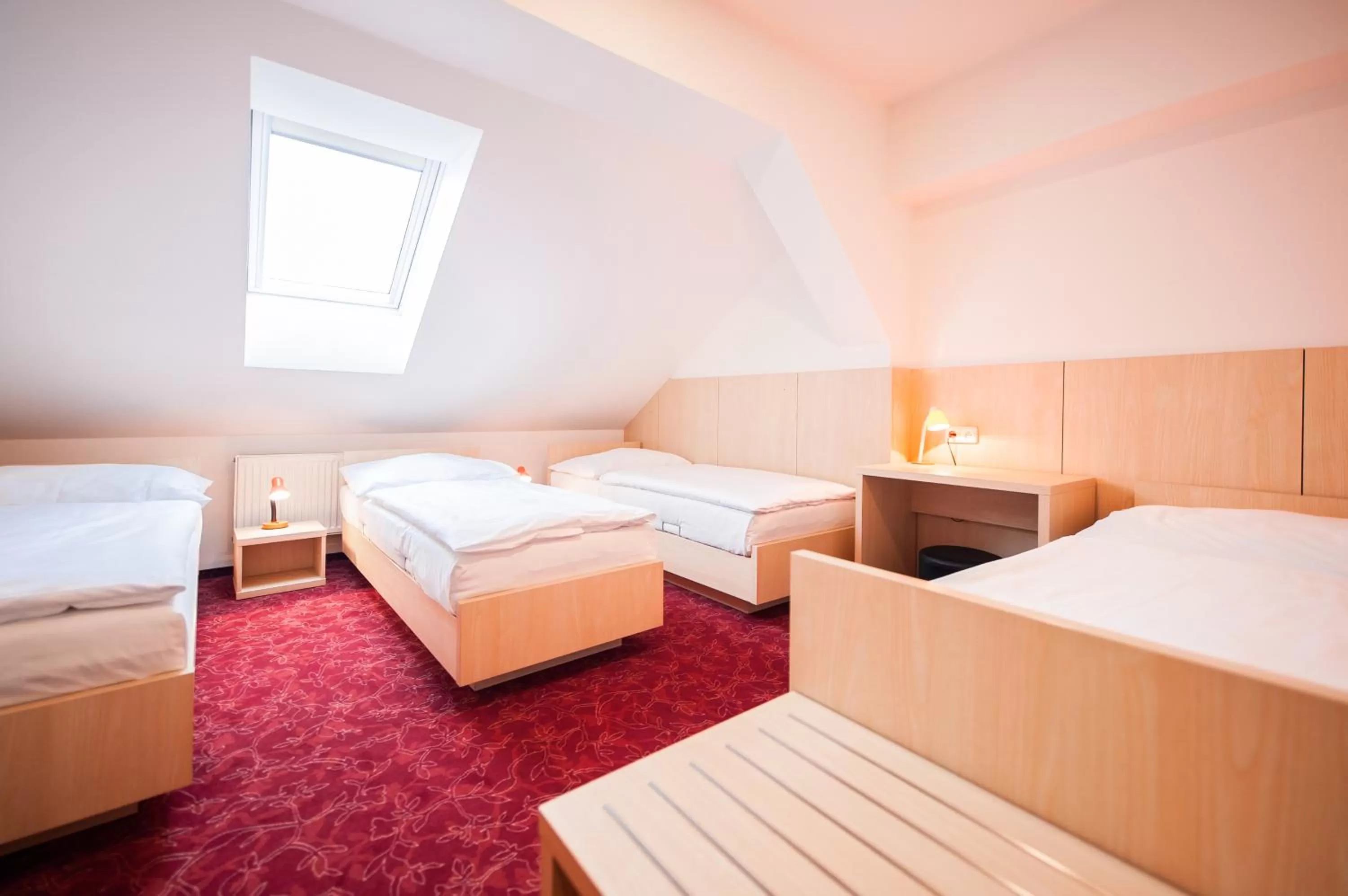 Bed in Hotel Pivovar