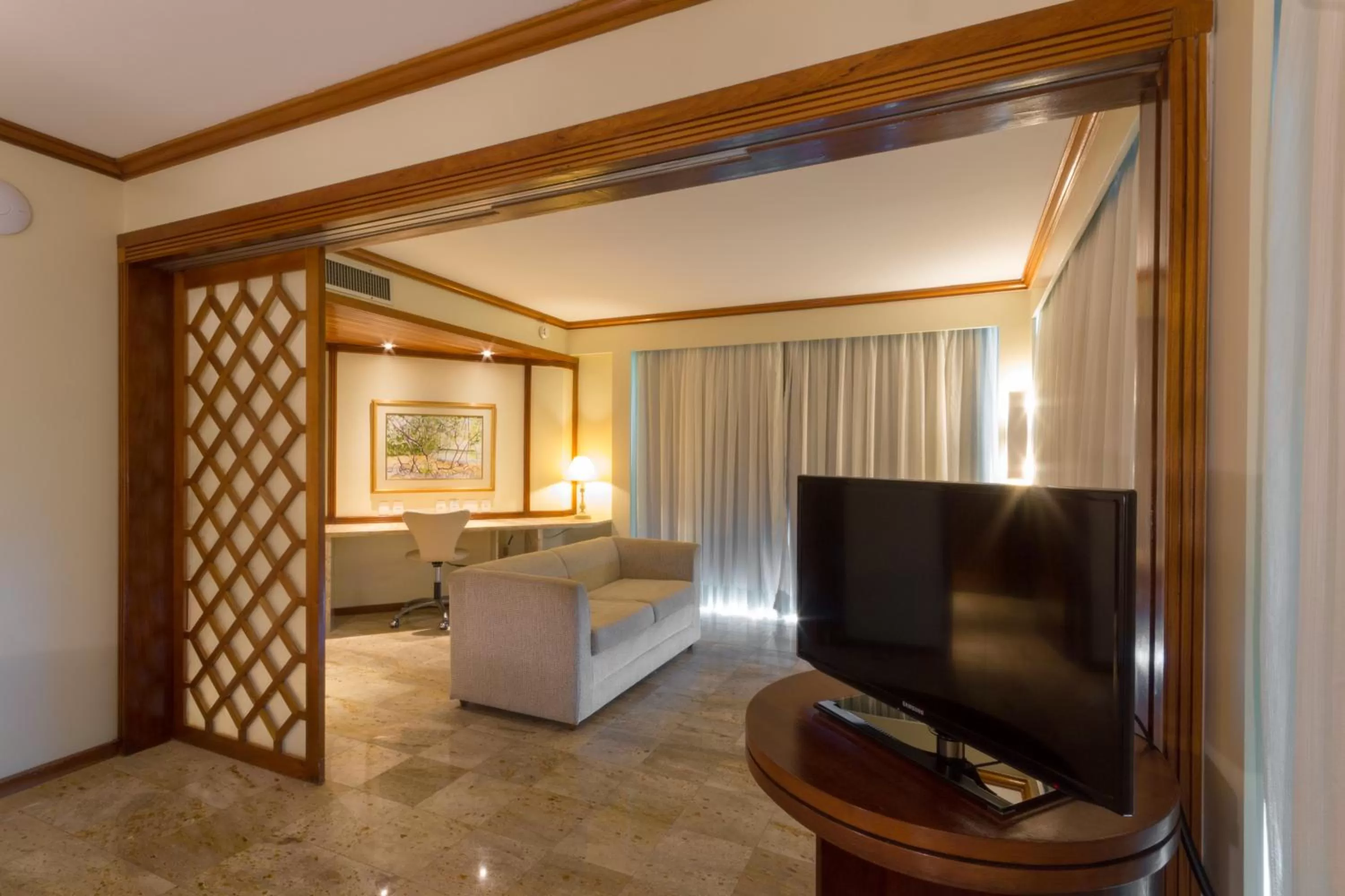 Communal lounge/ TV room, Bed in Hotel Atlante Plaza