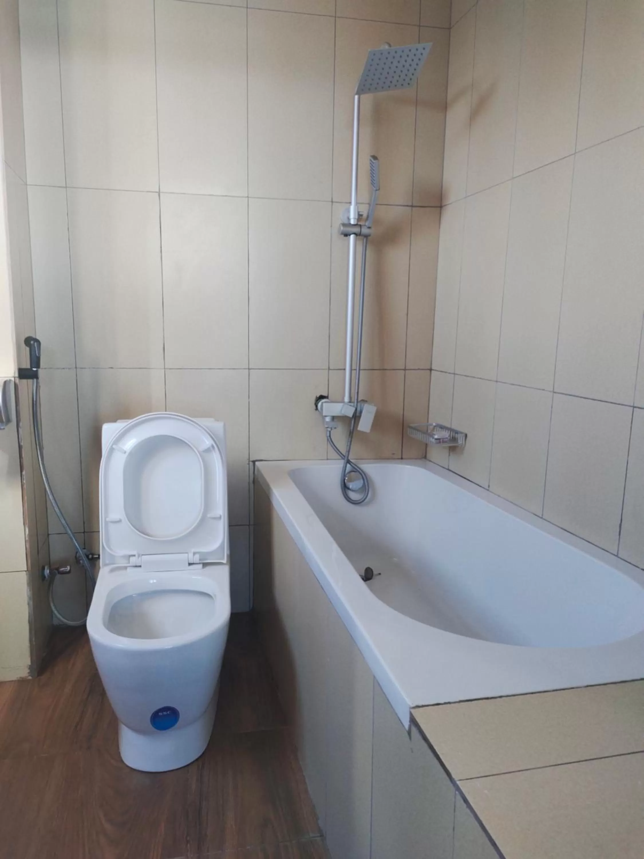 Toilet, Bathroom in Serene Beach Resort