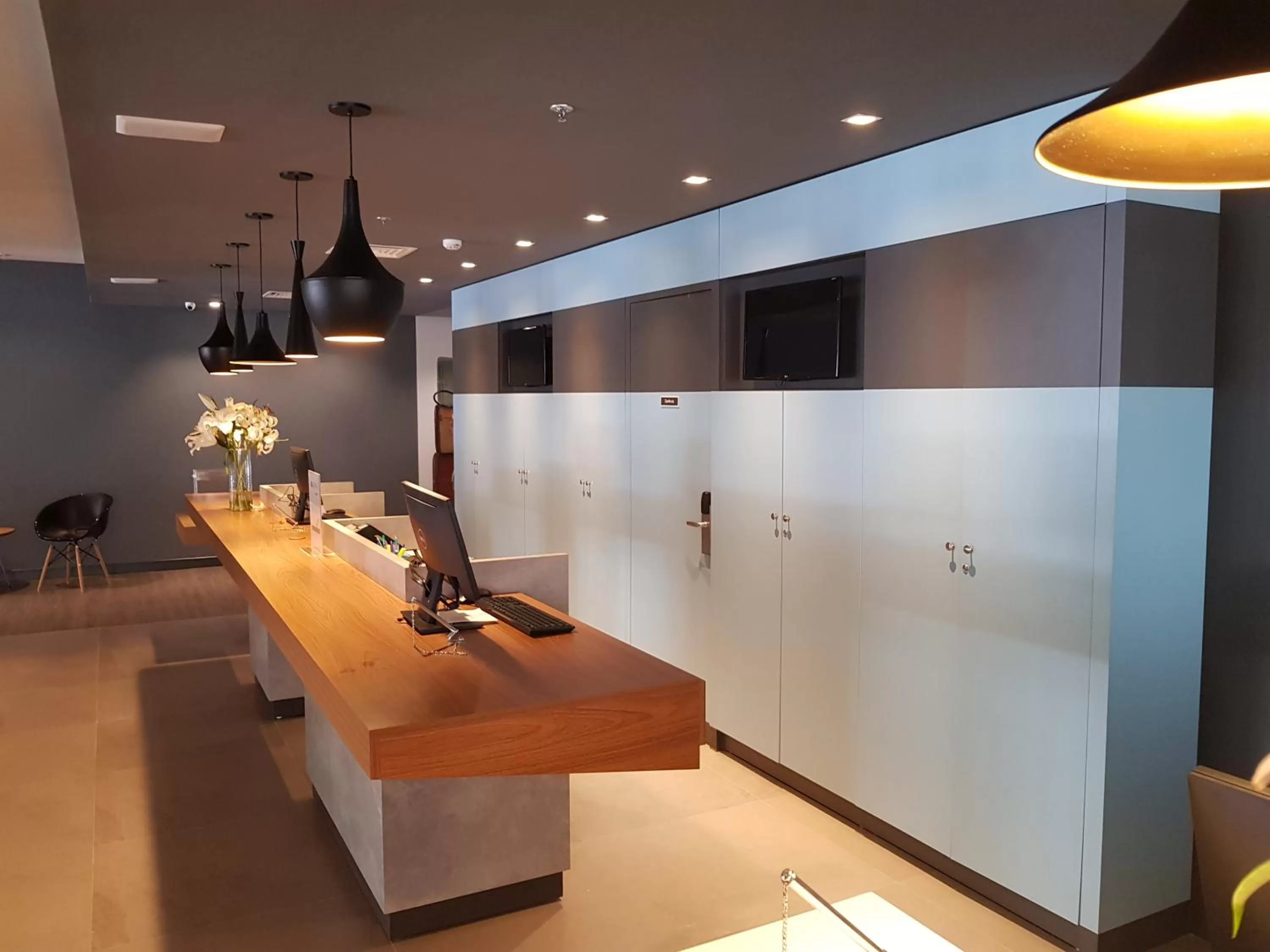 Lobby or reception in ibis Carlos Barbosa