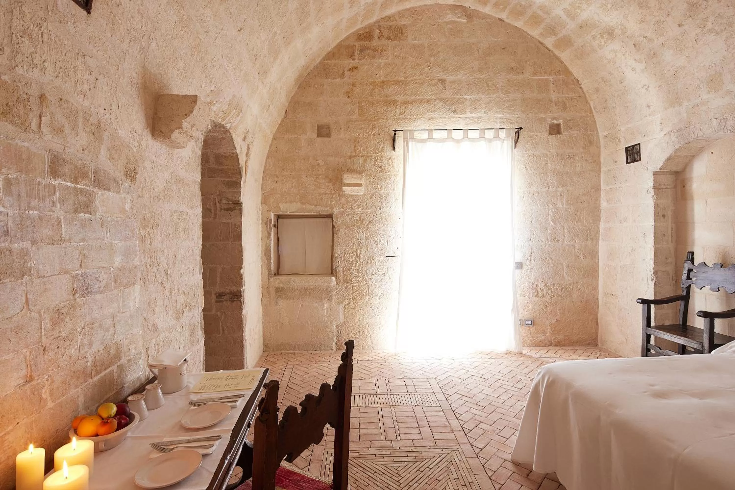 Dining area, Bed in Sextantio Le Grotte Della Civita