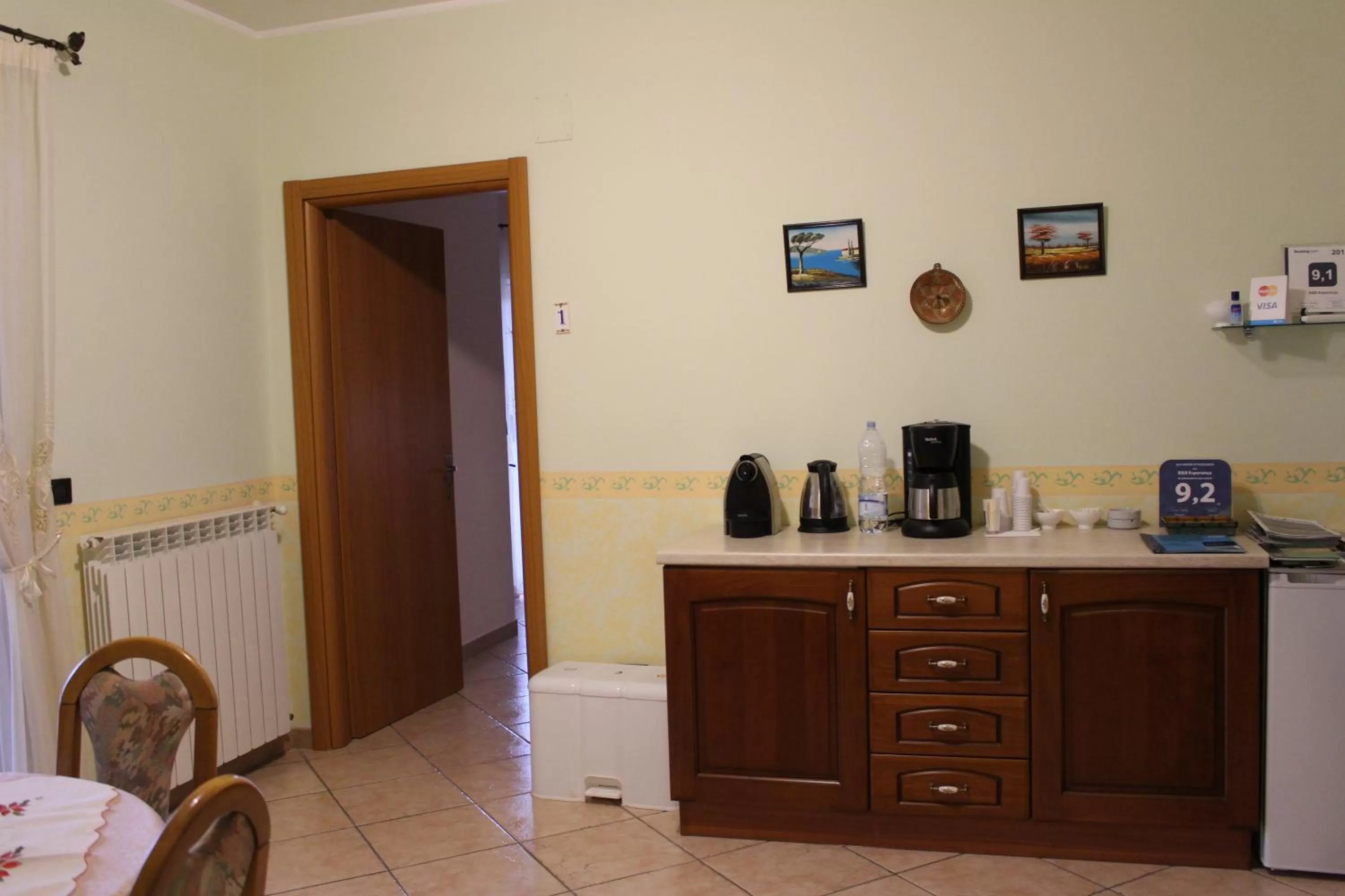 Communal lounge/ TV room in B&B Esperança