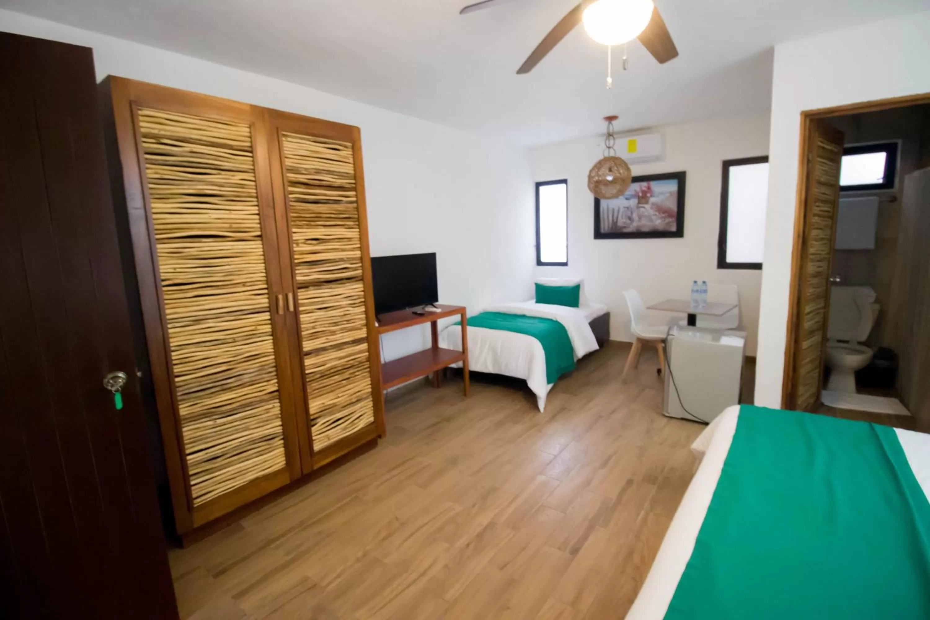 Photo of the whole room, Bed in Hotel Tequila Cancun