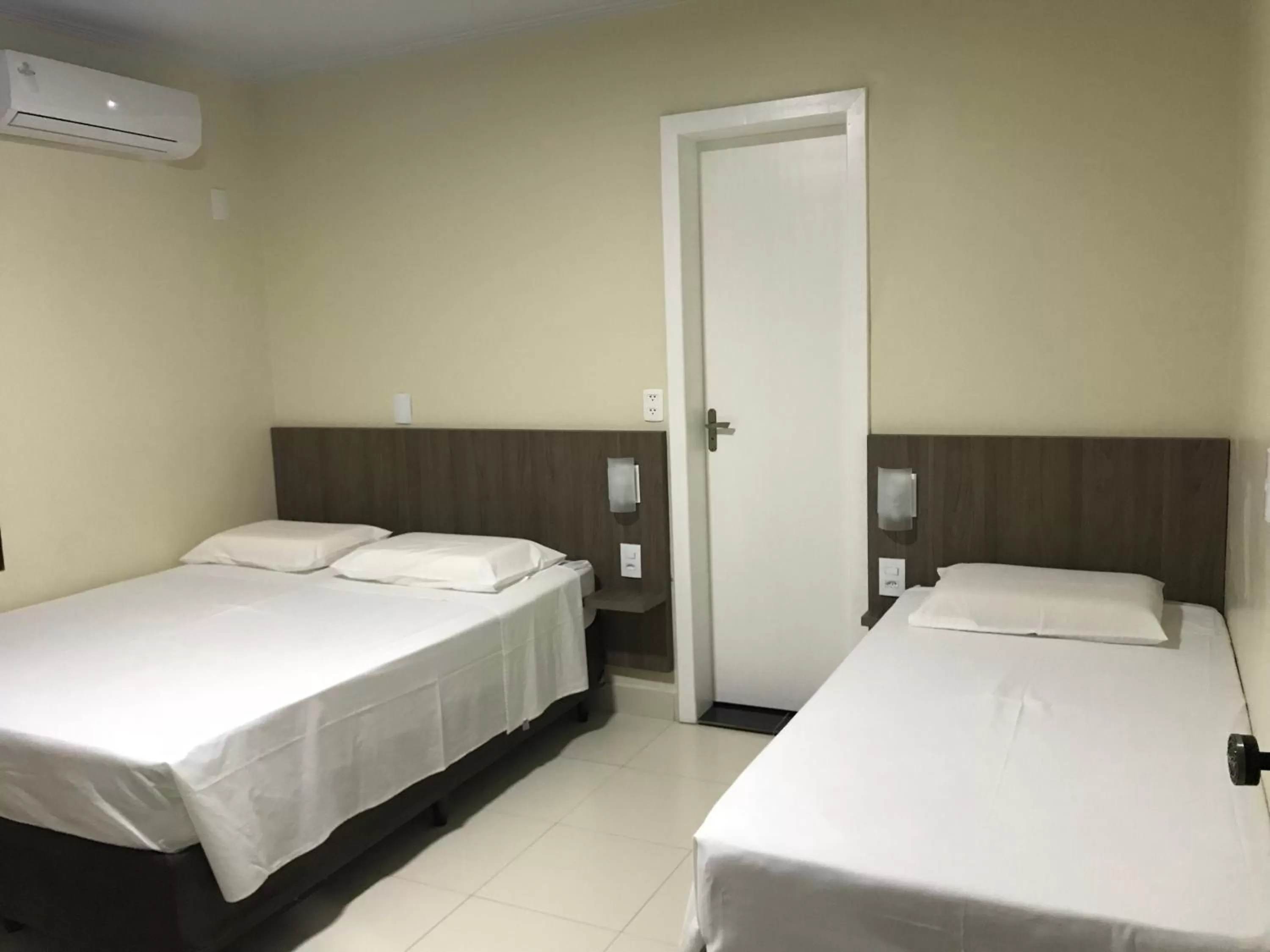 Bed in Pousada El Shaddai