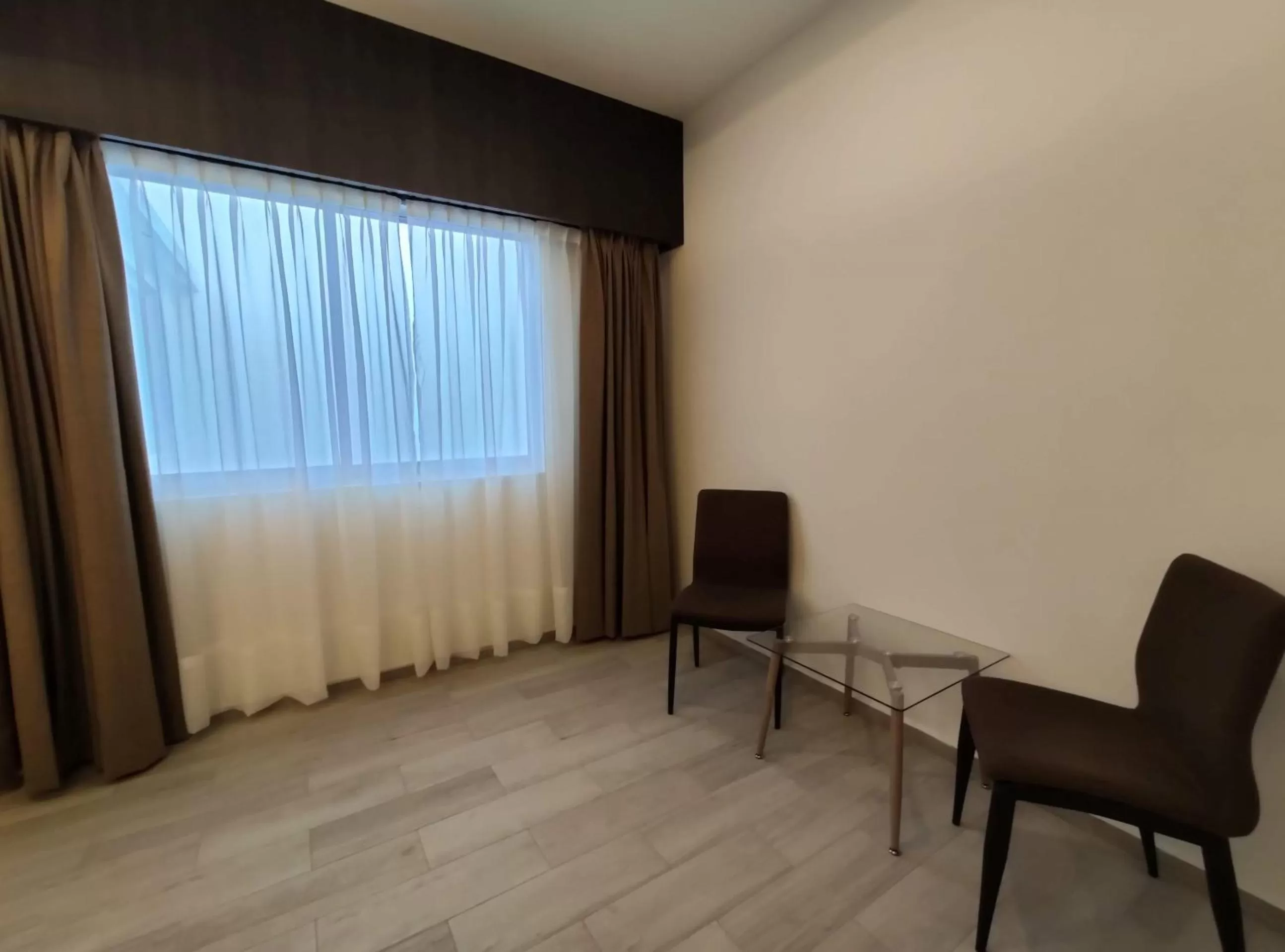 Seating area, TV/Entertainment Center in Hotel La Estancia Zacatlan