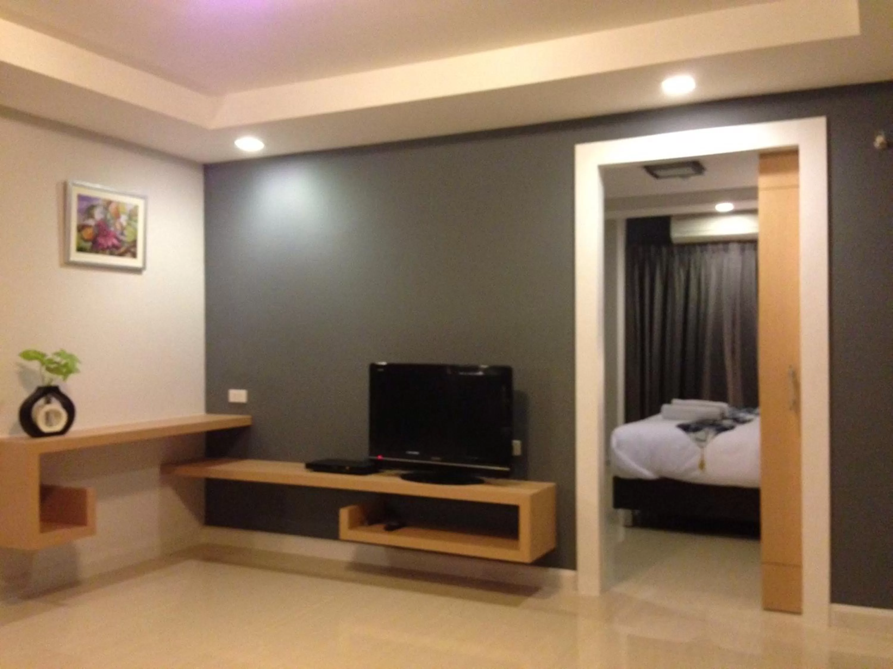 TV and multimedia, Bed in The Aim Sathorn Hotel