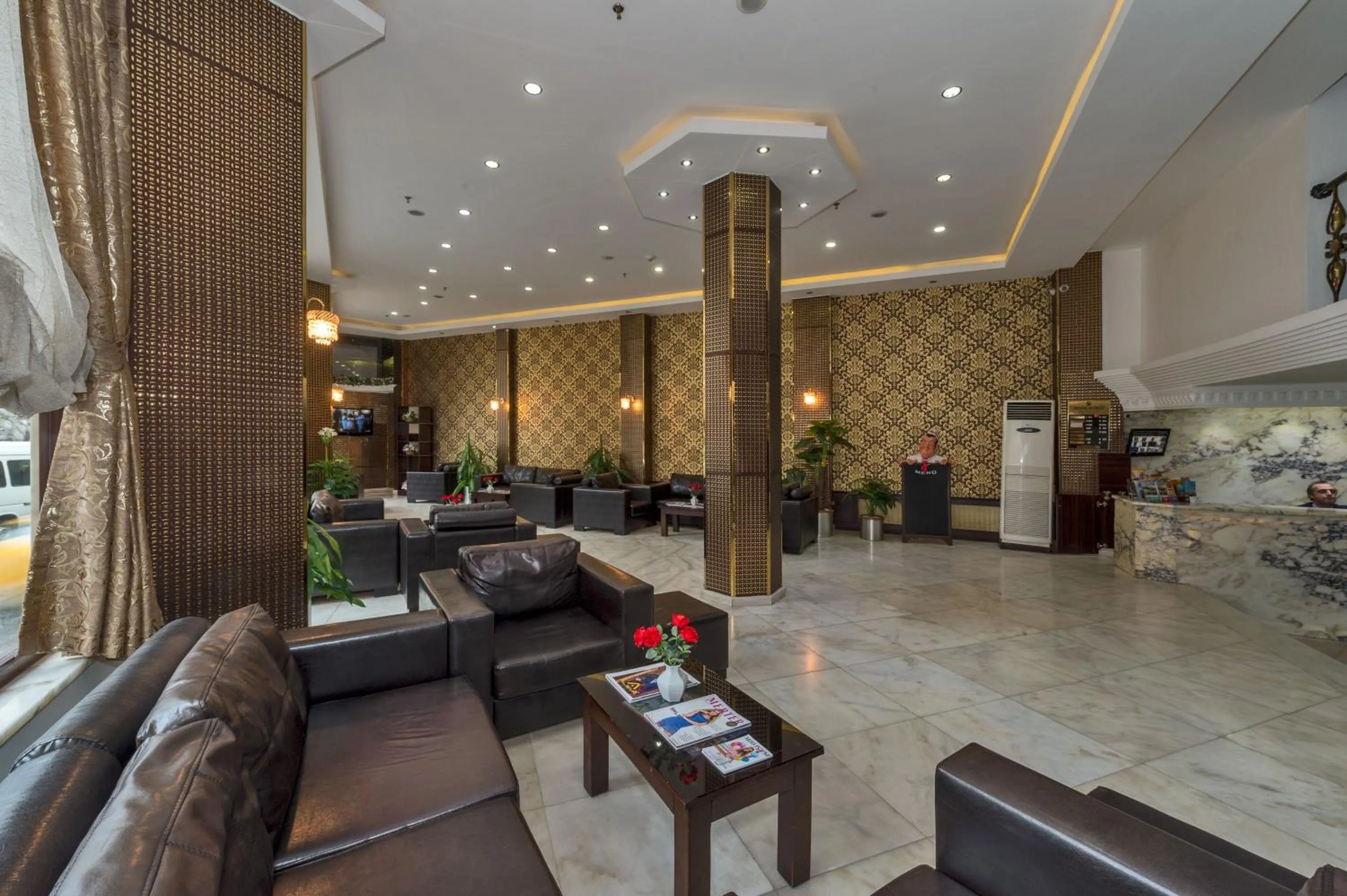 Communal lounge/ TV room in Kuran Hotel International