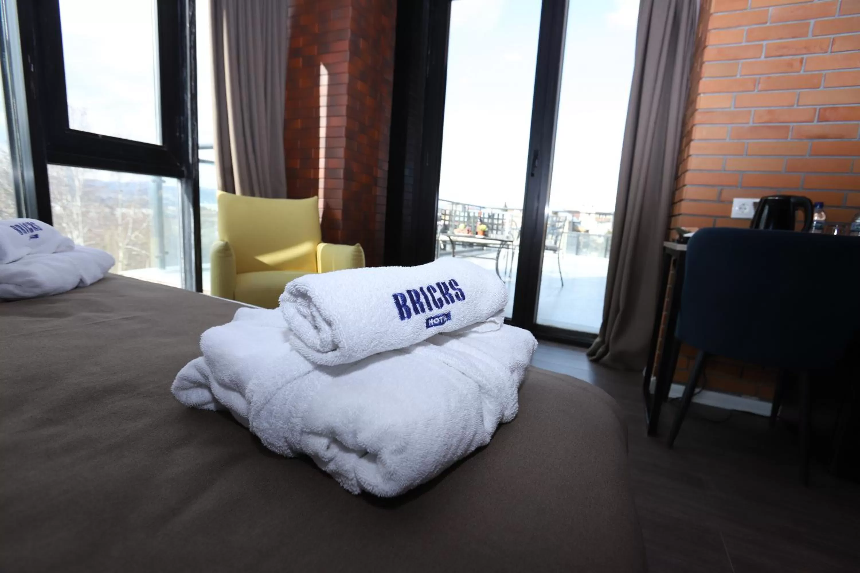 towels, Bed in Bricks Hotel Tbilisi