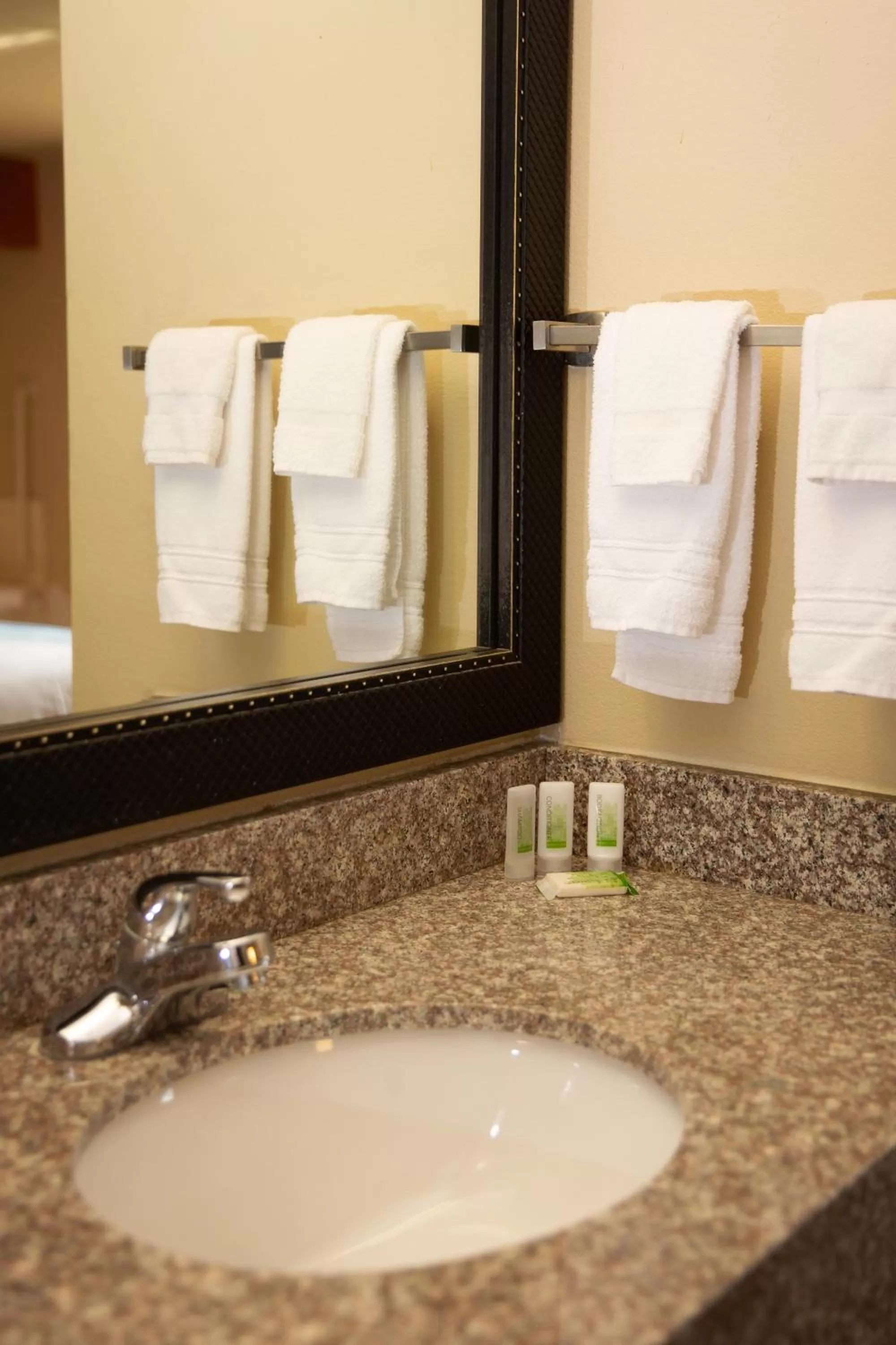 Bathroom in AmericInn by Wyndham Pampa Event Center