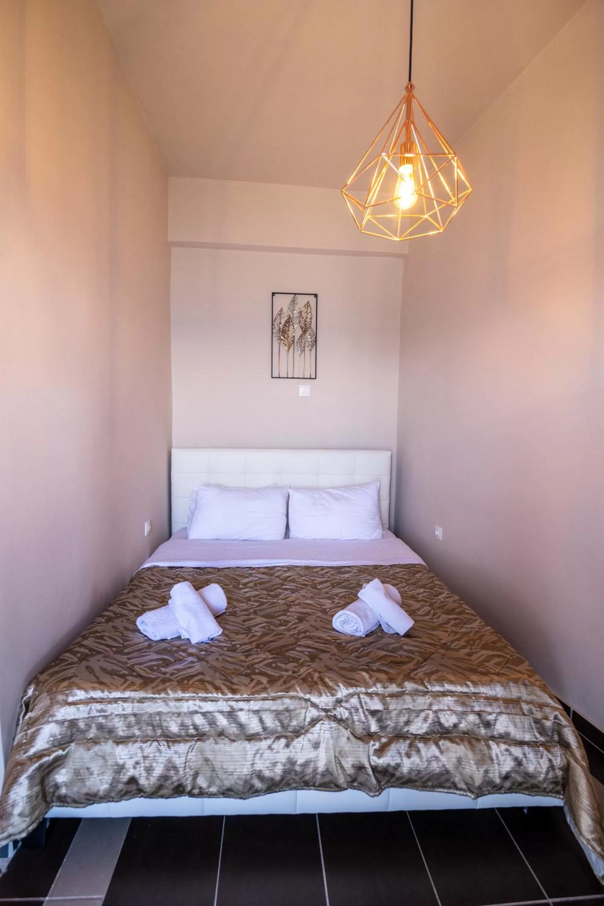 Bed in Votsalakia Hotel & Luxury Apartments