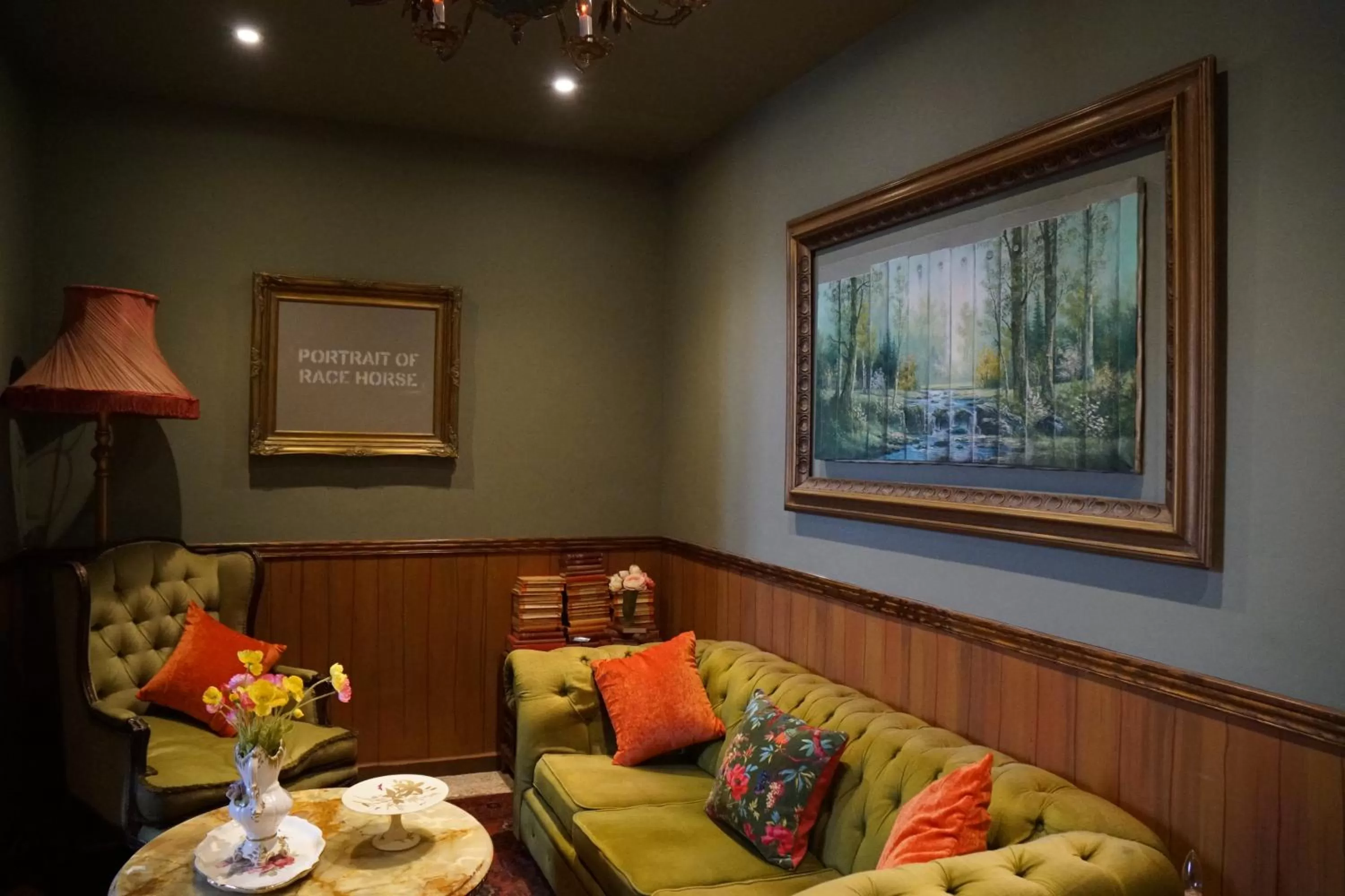 Communal lounge/ TV room in The Walled Off Hotel