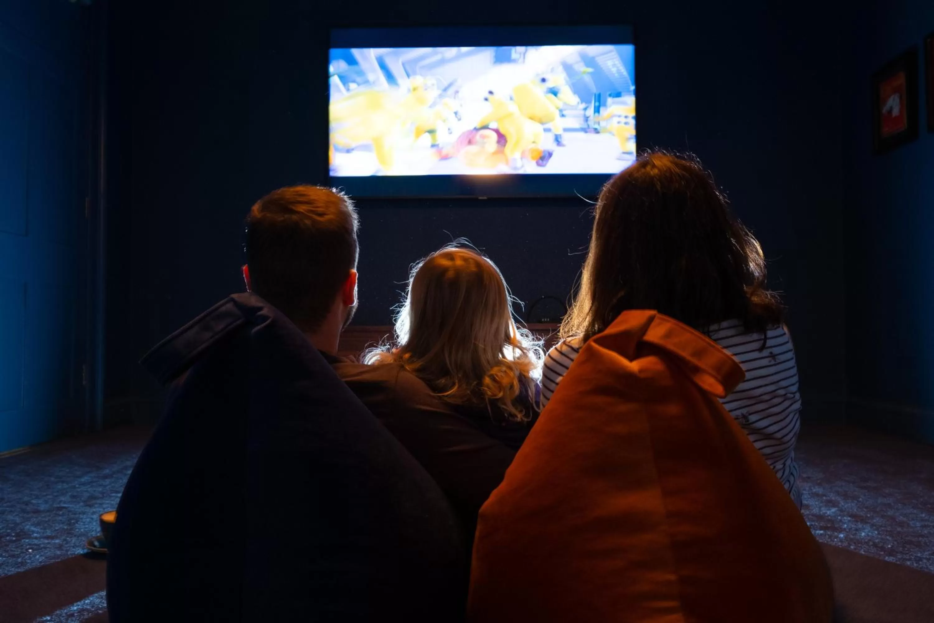Communal lounge/ TV room in Fowey Hall Hotel