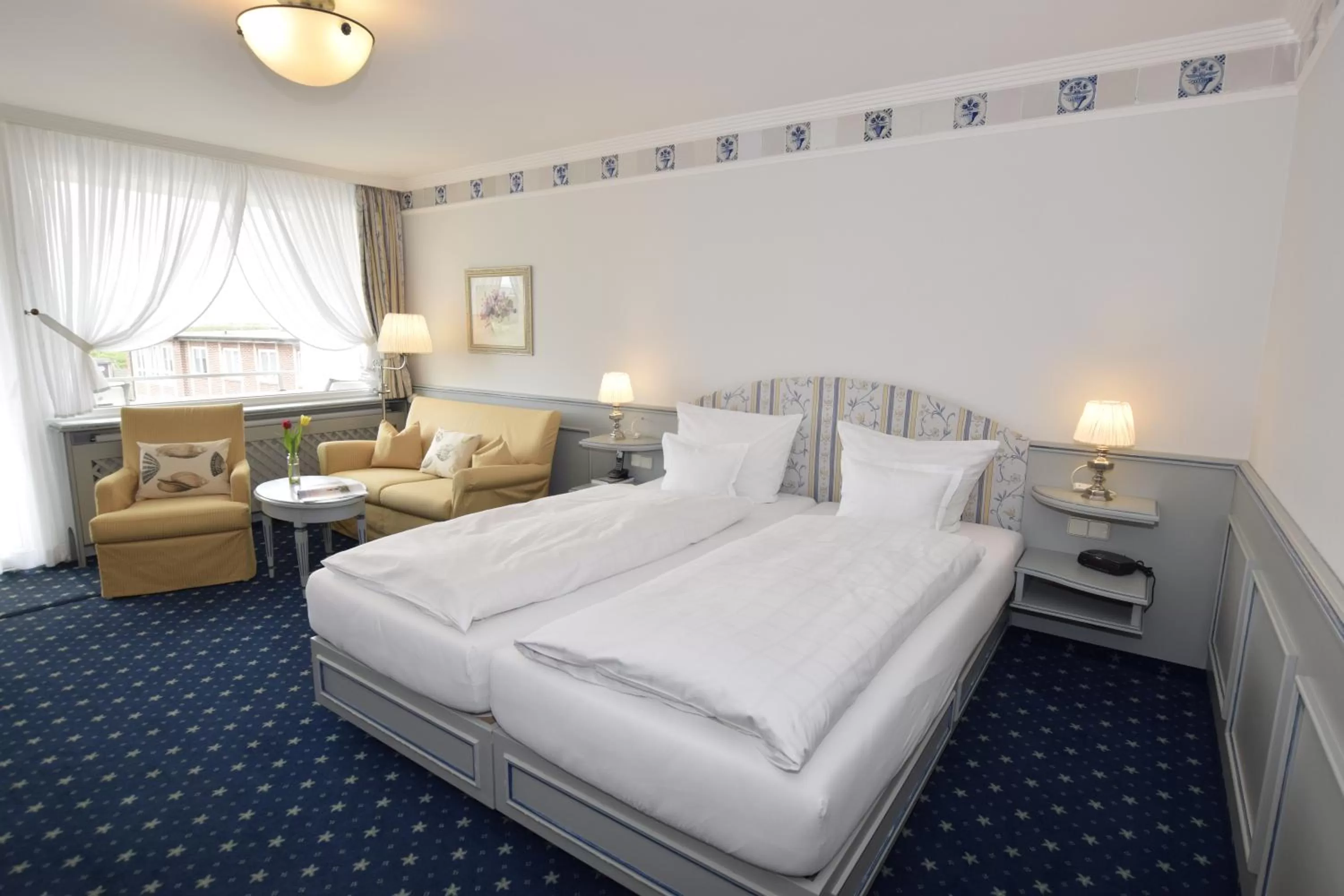 Living room, Bed in Hotel Wiking Sylt