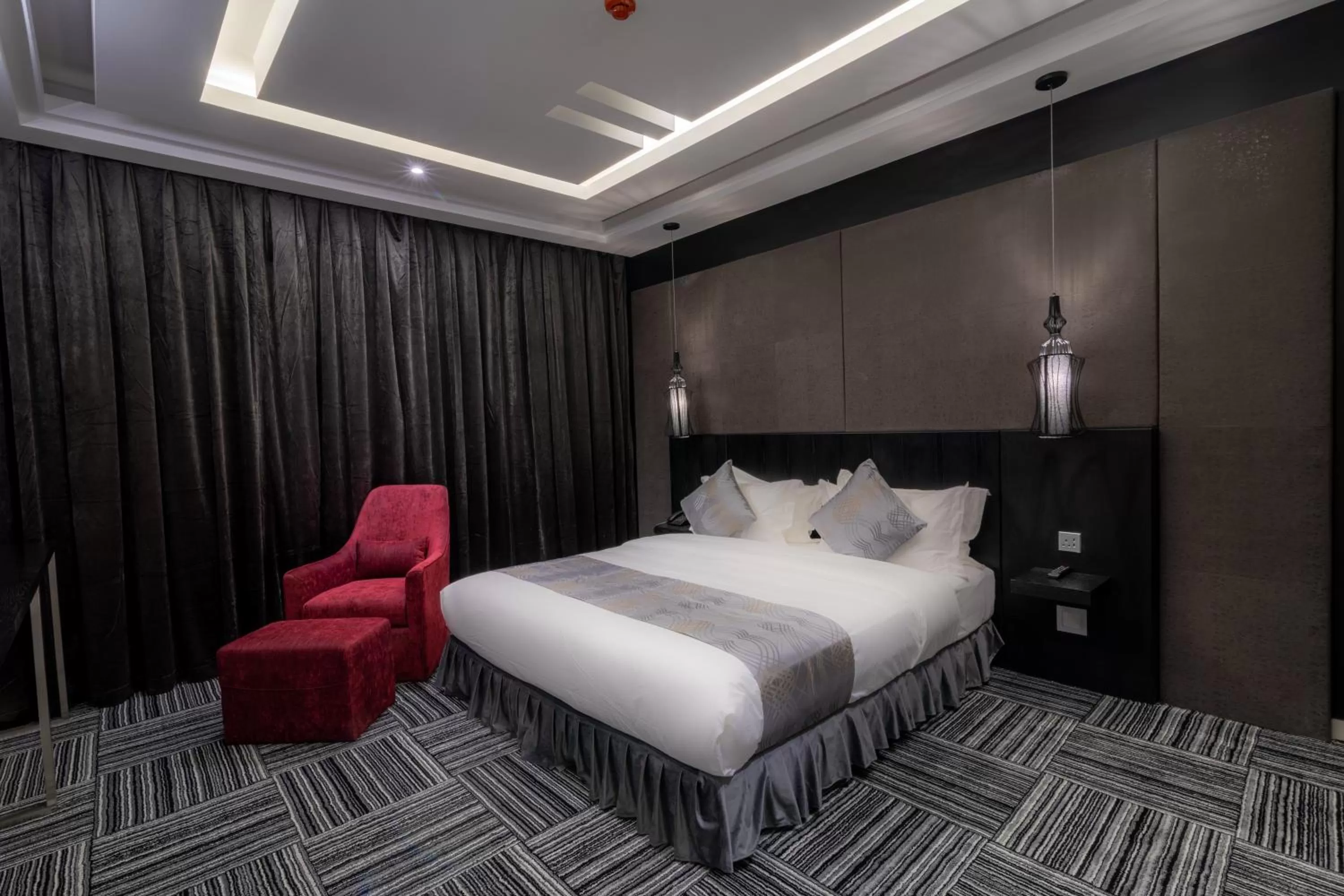 Bed in South Hotel Suites