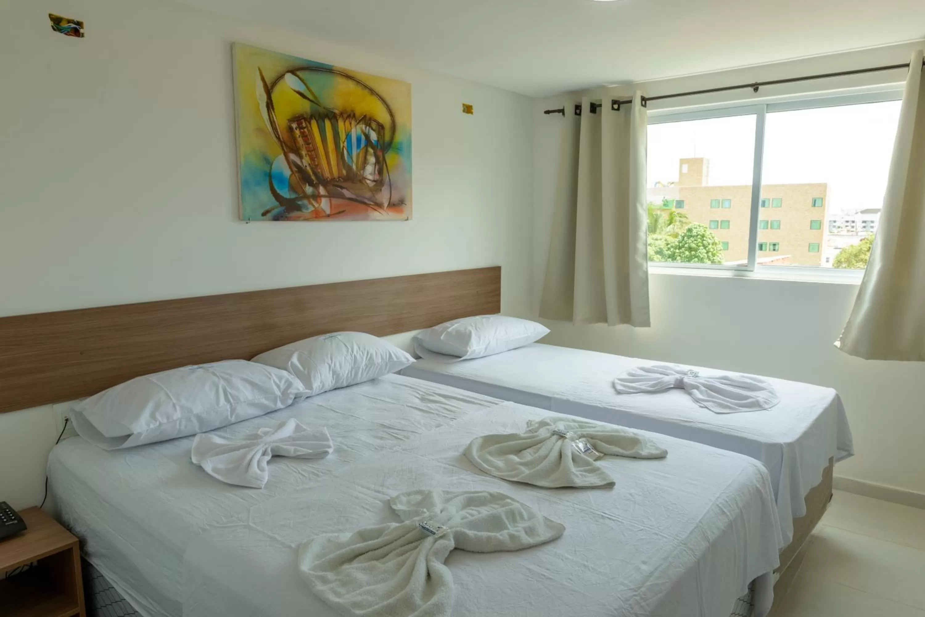 Bed in Anjos Praia Hotel
