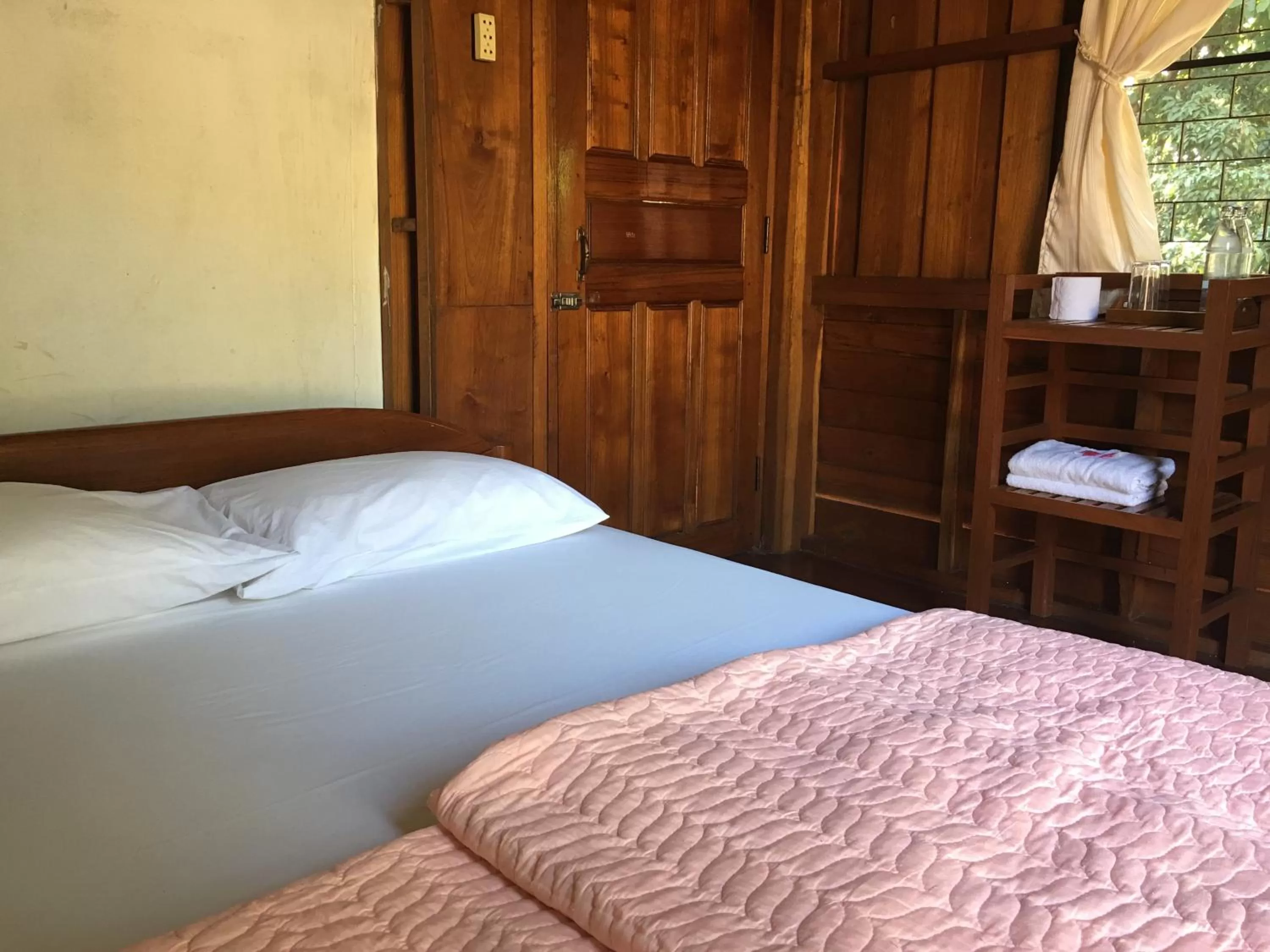 Bed in ห้วยน้ำรินรีสอร์ท The Creek Garden Resort