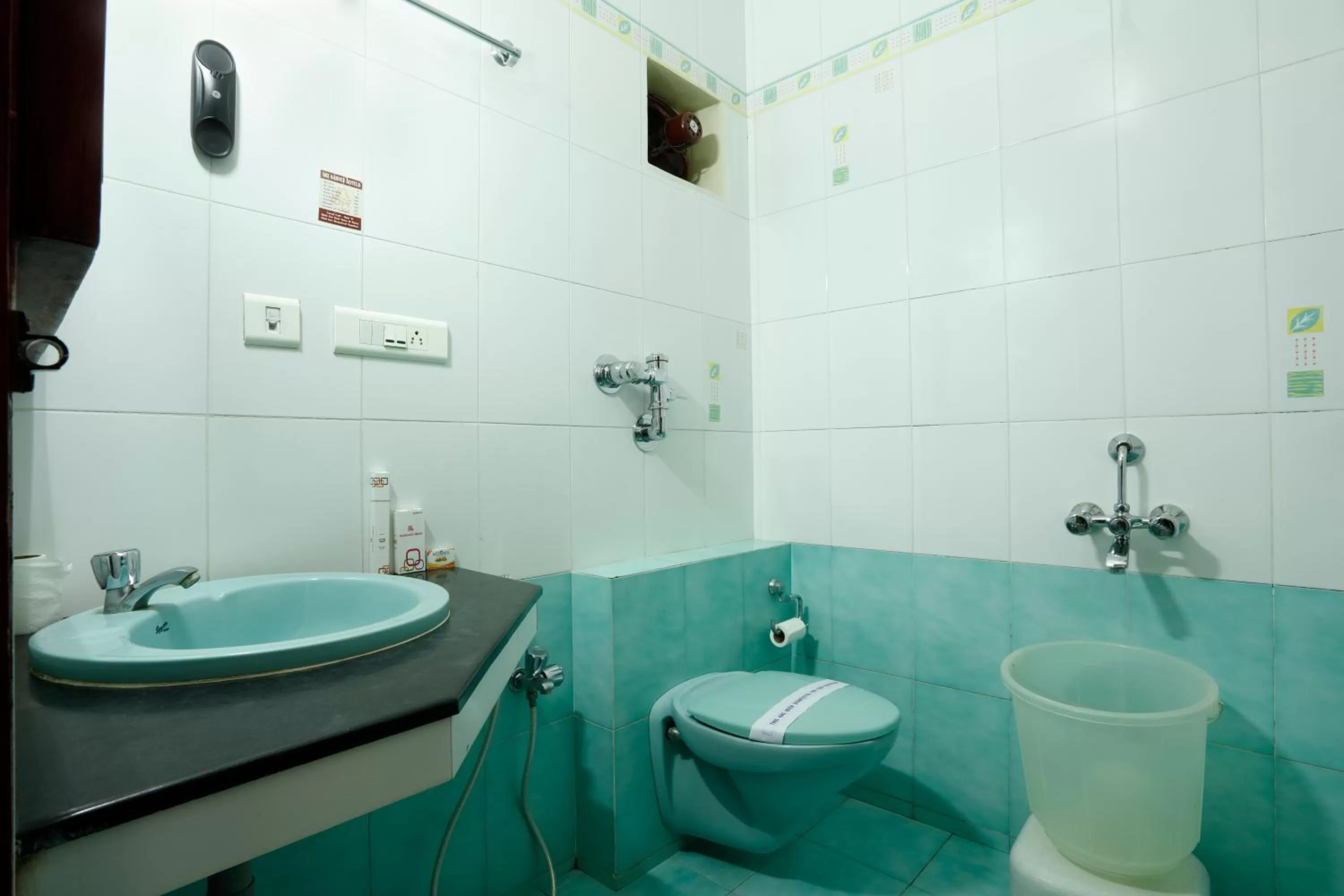 Bathroom in Sri Aarvee Hotels