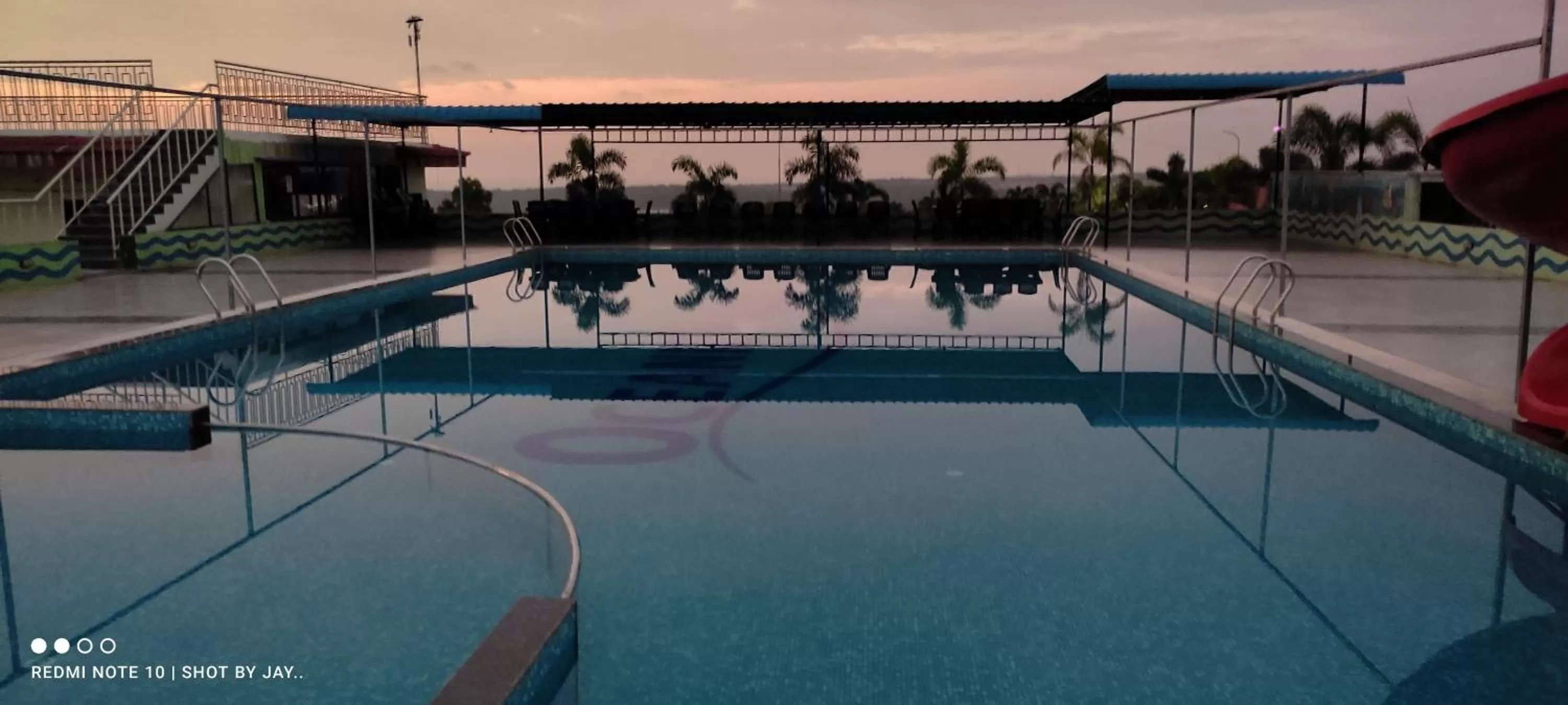 Swimming pool in Mango Valley Resort Ganpatipule