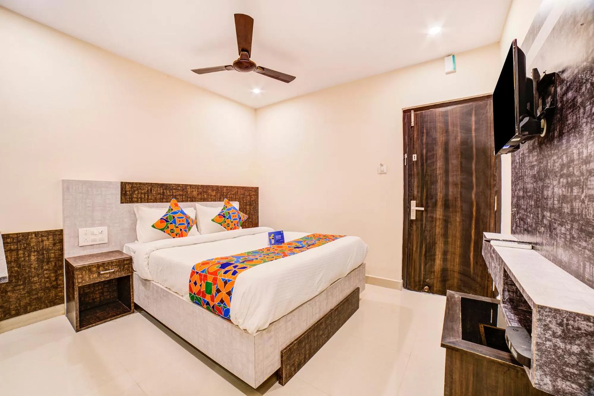 Dining area, Bed in FabHotel Spark Inn Dwarakanagar