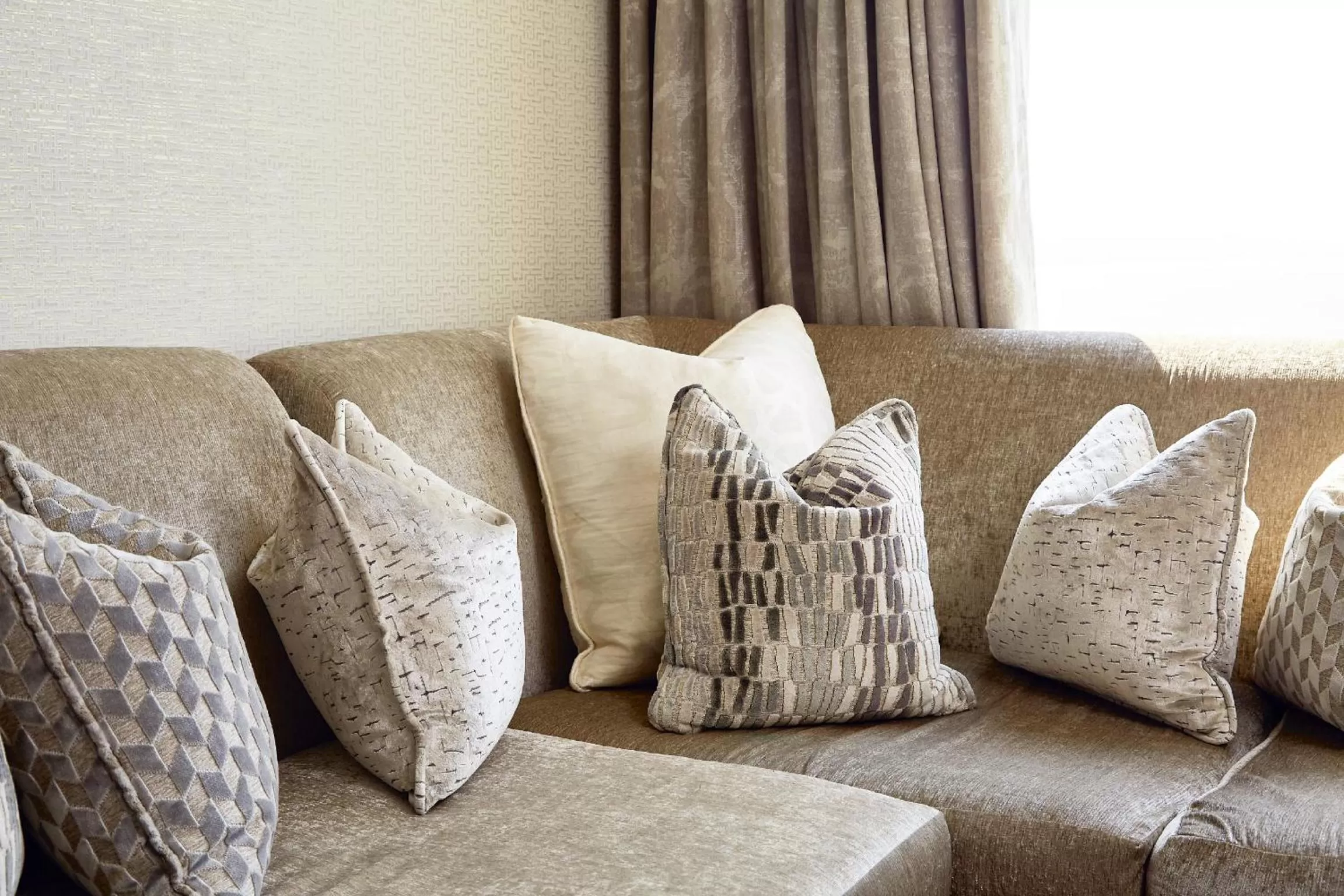 Seating area in First Group The Palace All-Suite