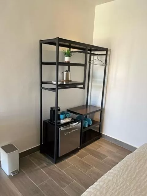 Coffee/tea facilities, Bed in The Cove Boutique Hotel Adults Only