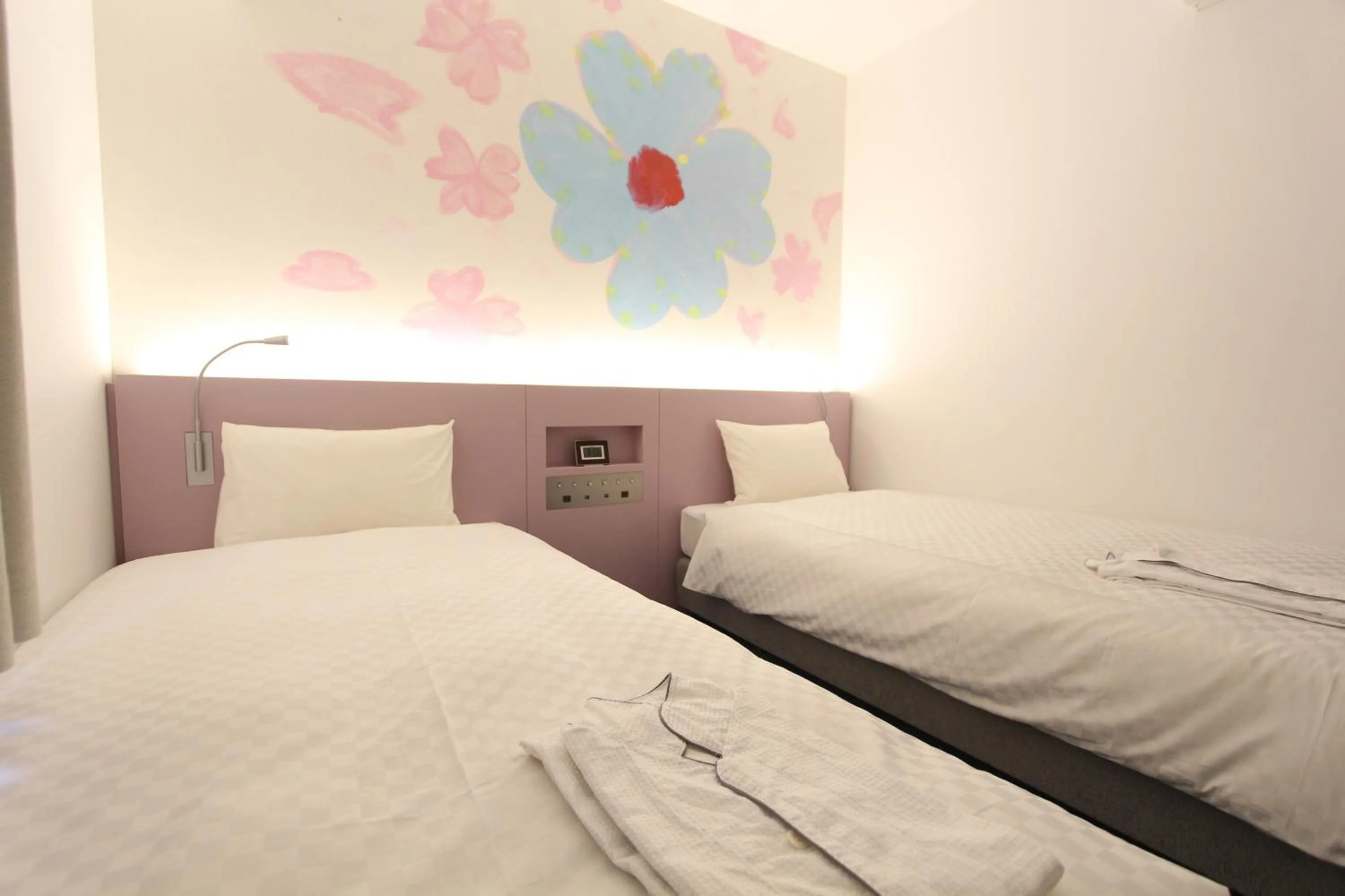 Bed in KOKO HOTEL Osaka Namba Ebisucho