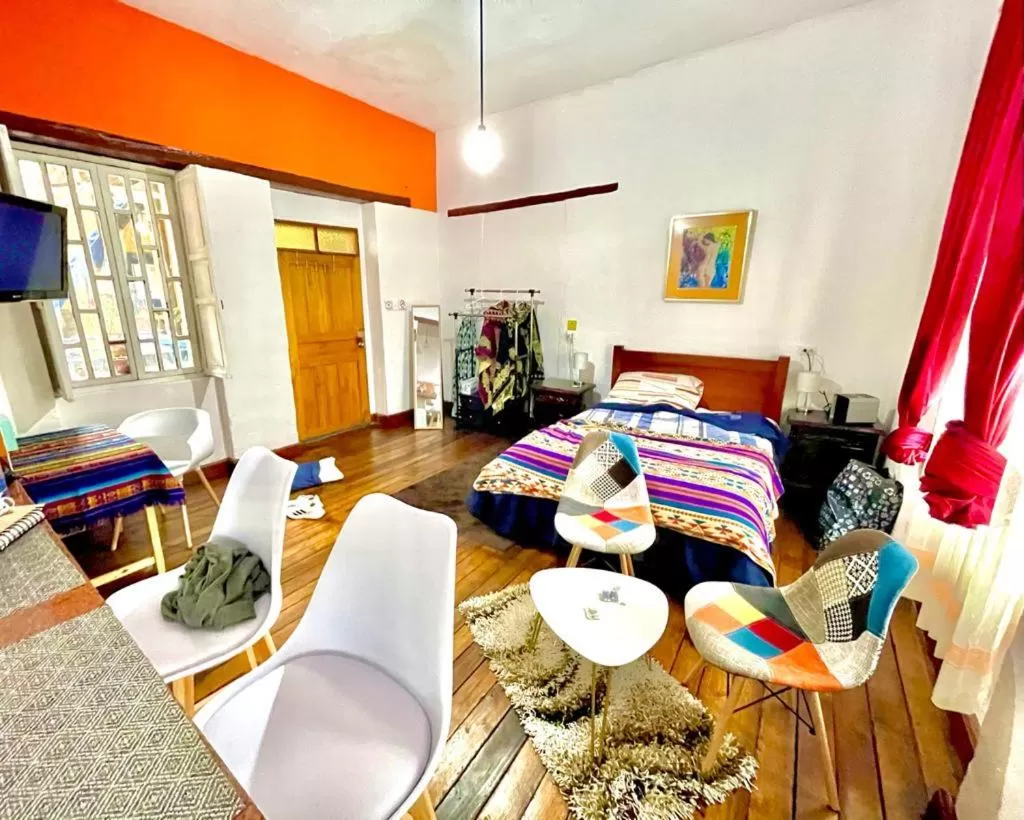 Bed in Blue Door Housing Historic Quito