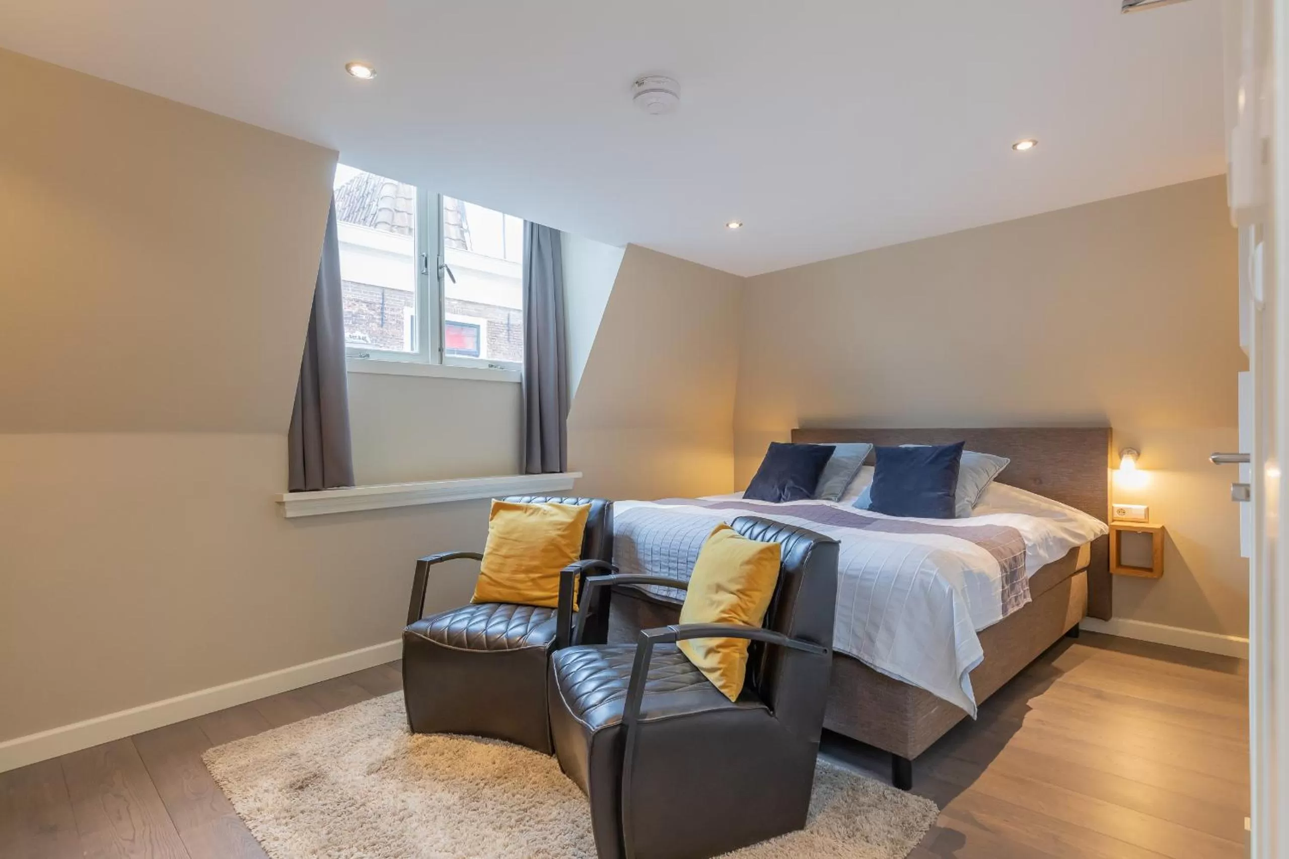 Bed in ExLibris Boutique Hotel