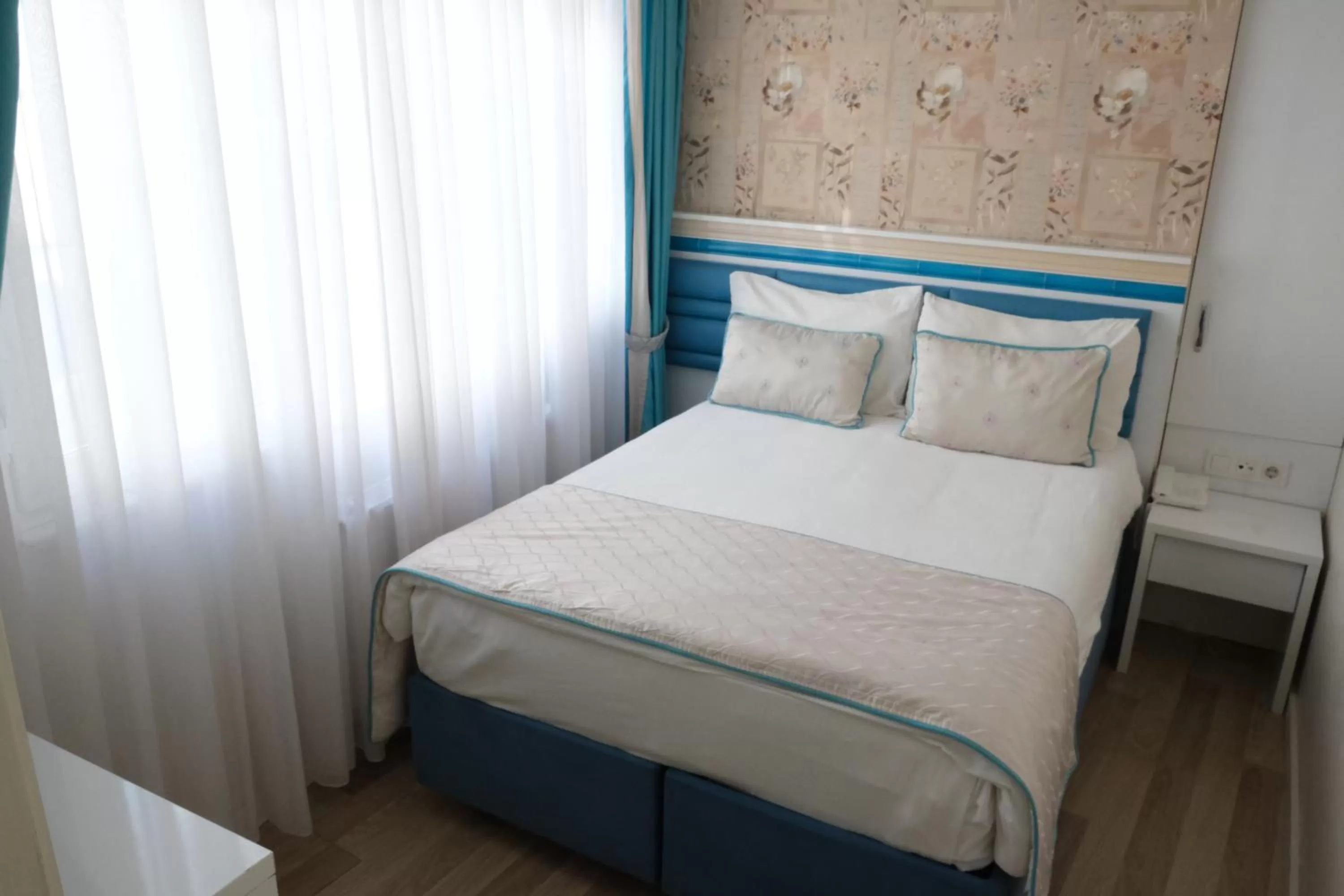 Bed in Star Holiday Hotel