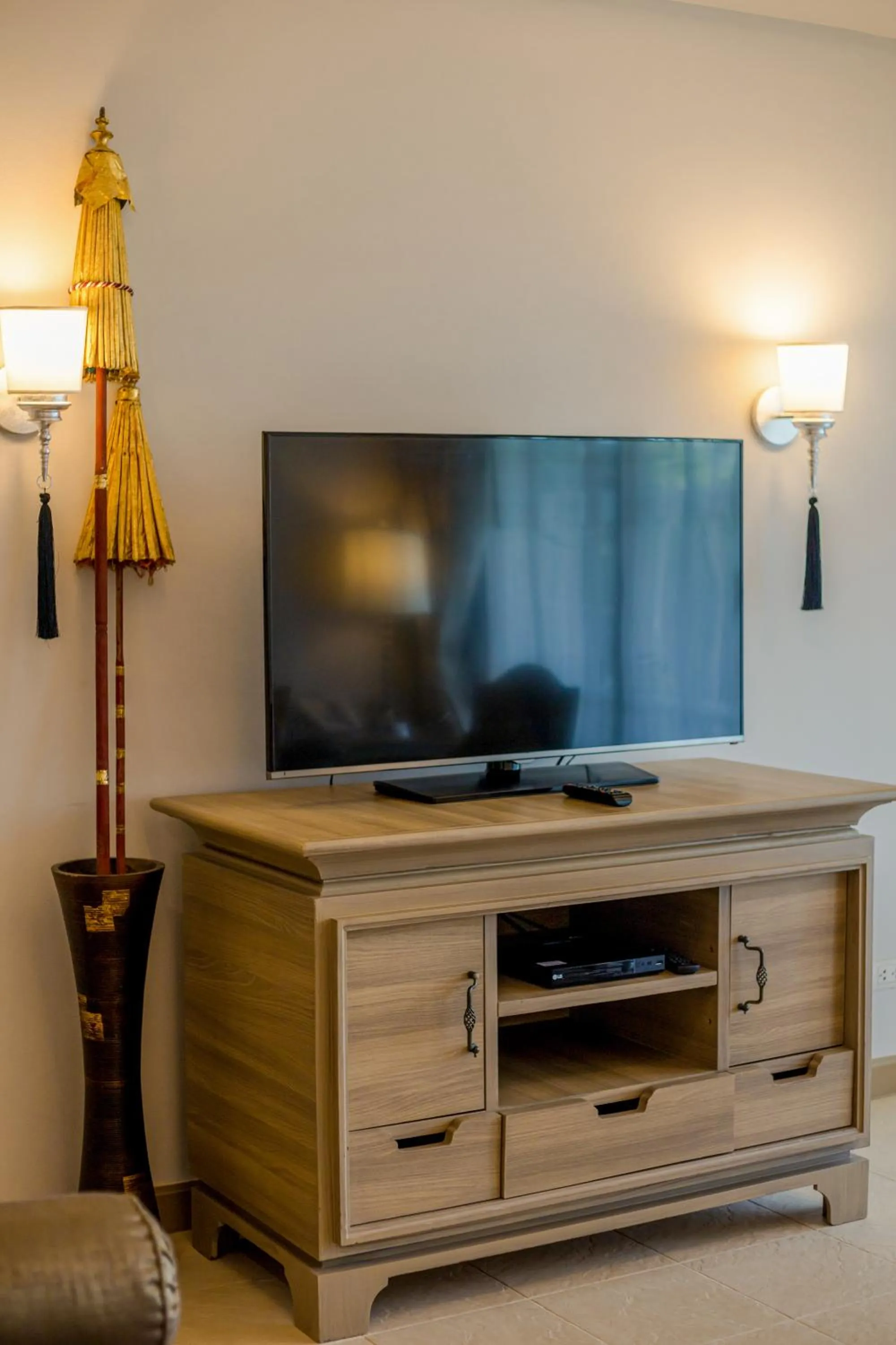 TV and multimedia in Ravindra Beach Resort & Spa - SHA Extra Plus