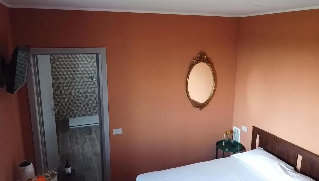 Bed in Sala dell Estate Guest House