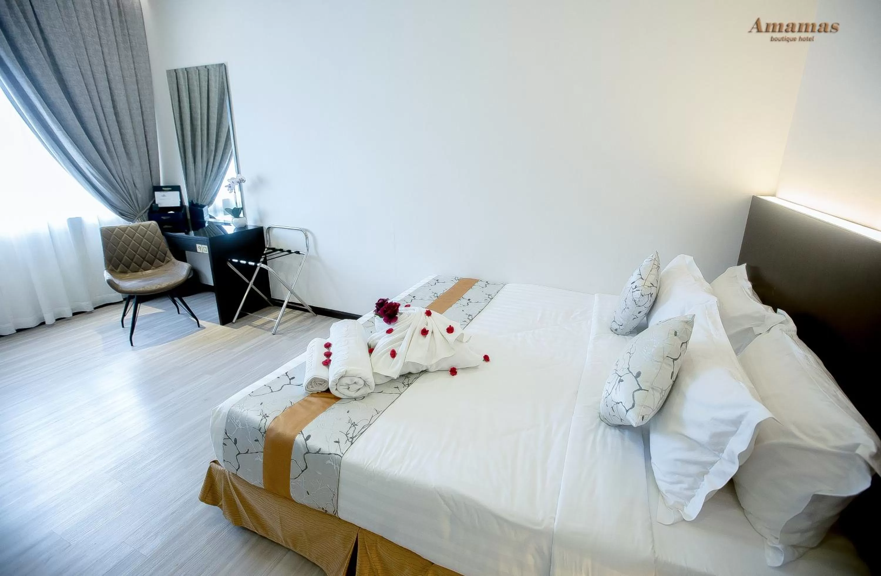 Bed in Amamas Boutique Hotel Kuching