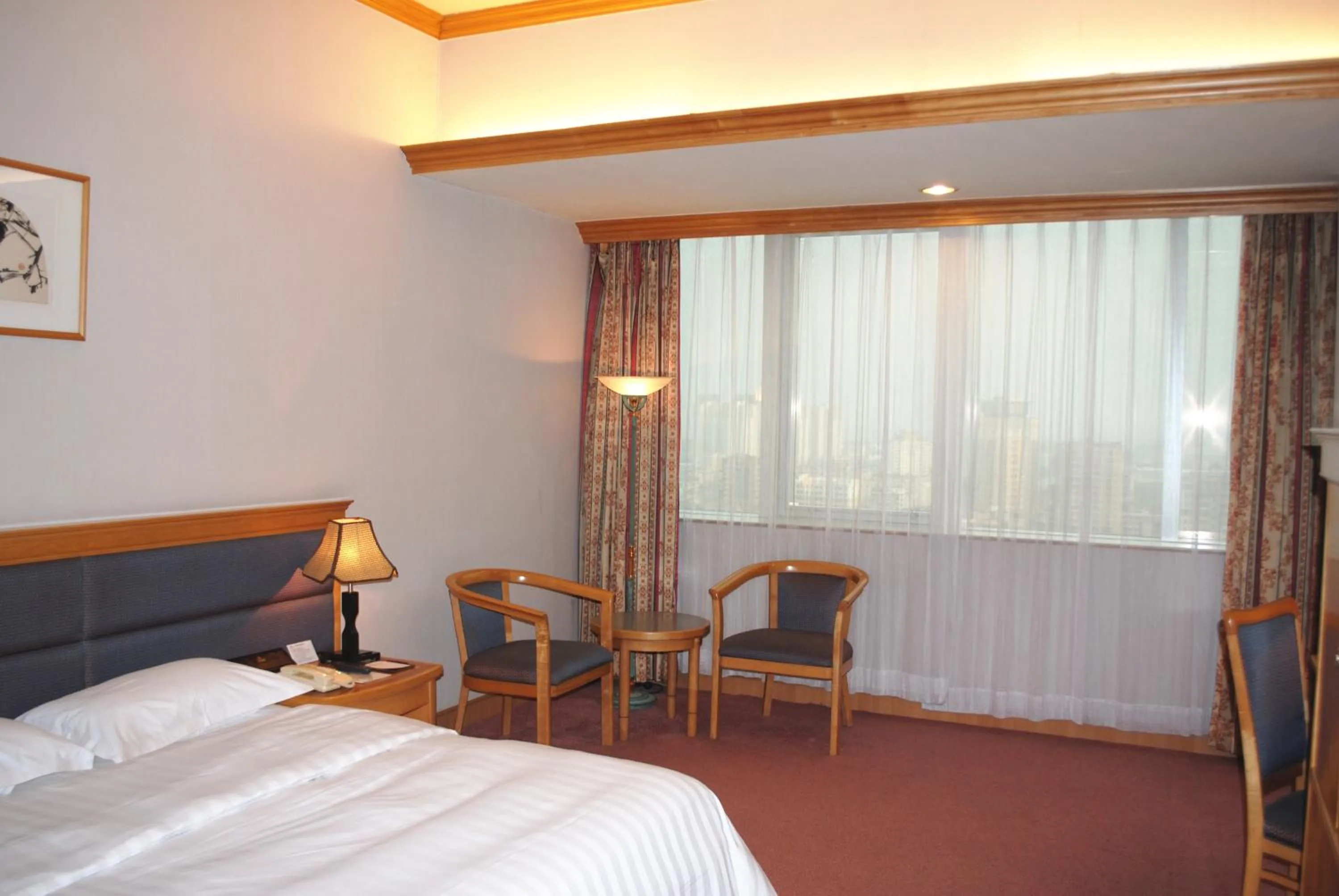 Bed in Guangzhou New Century Hotel