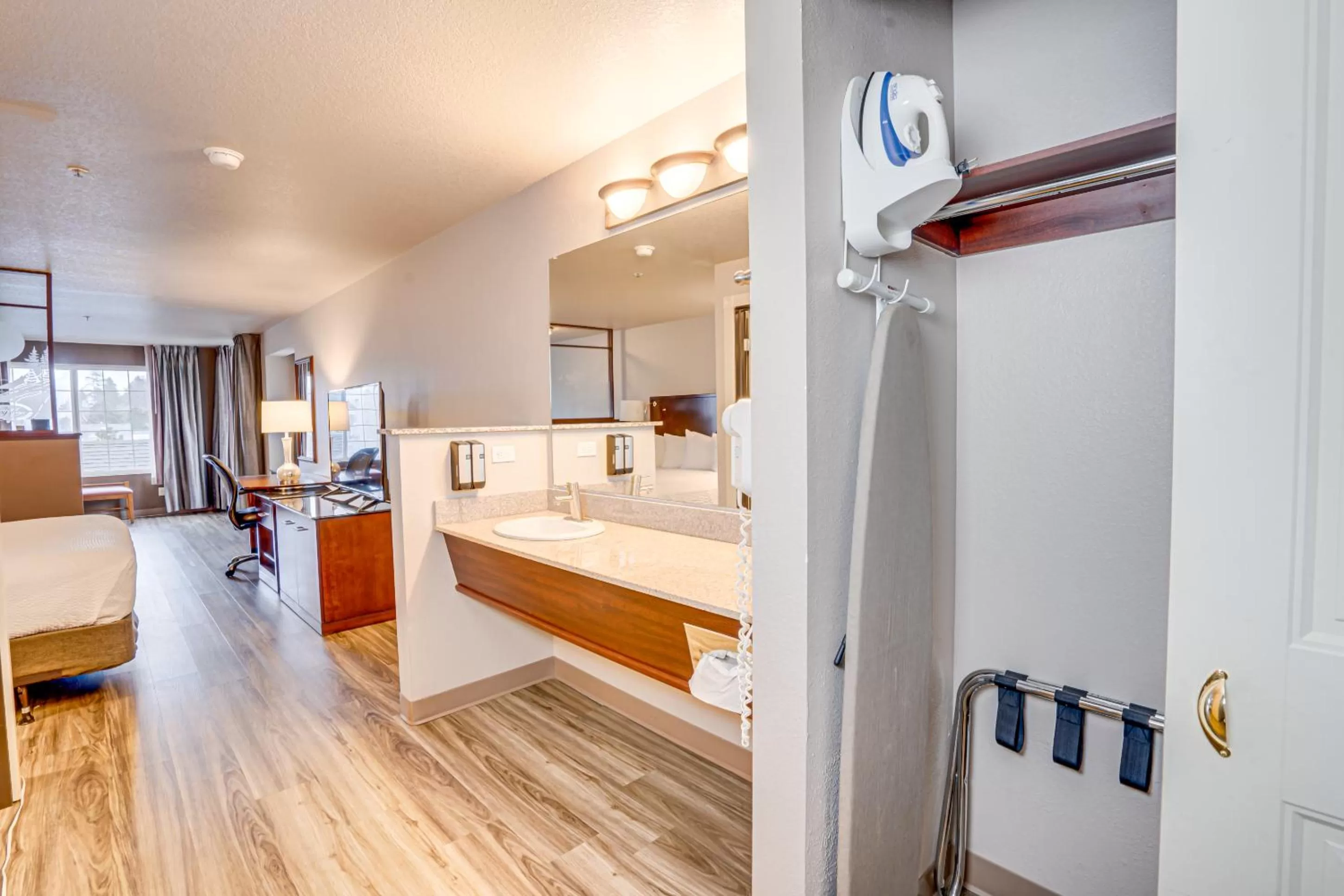 Bed in The Ashley Inn & Suites