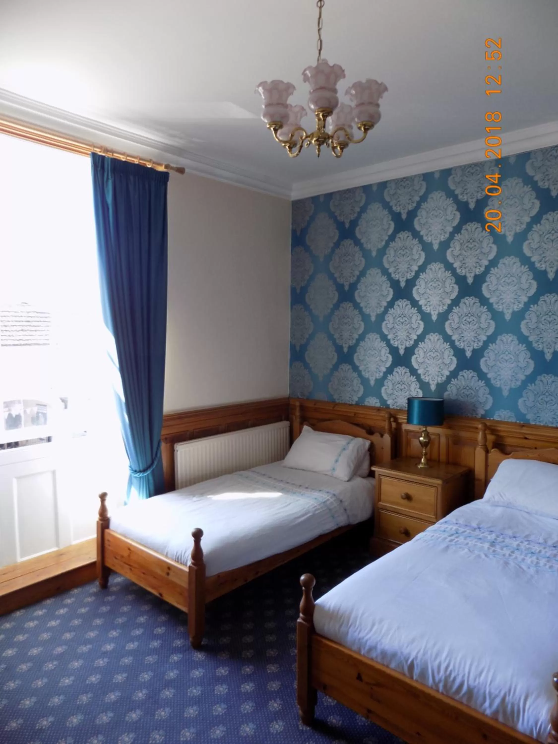 Bed in The Londesborough Arms bar with en-suite rooms