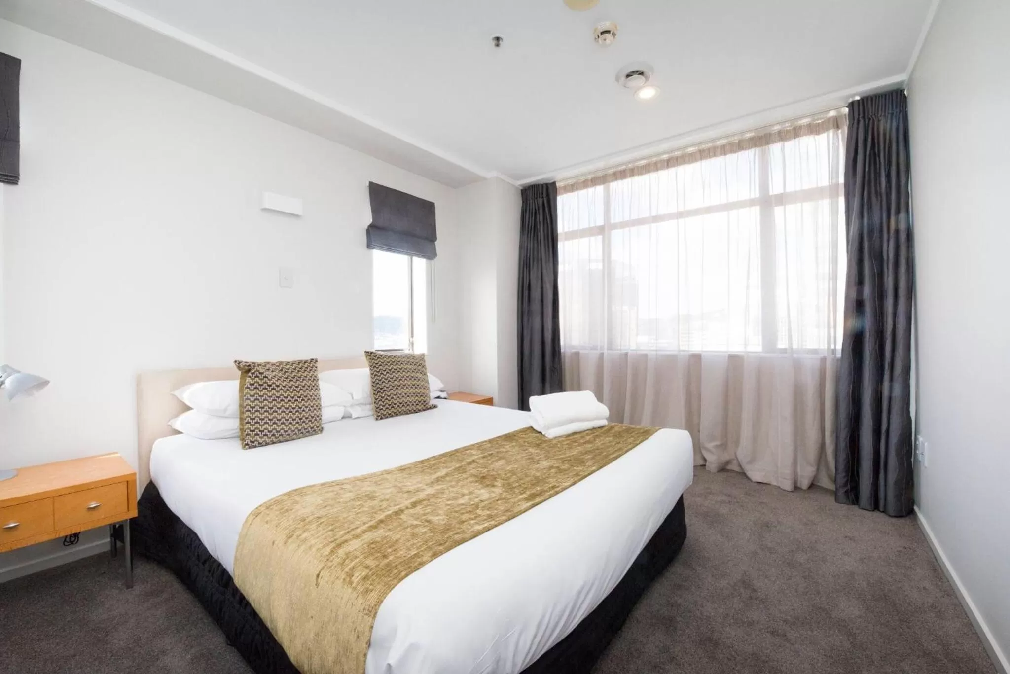 Bed in Quest on Johnston Serviced Apartments