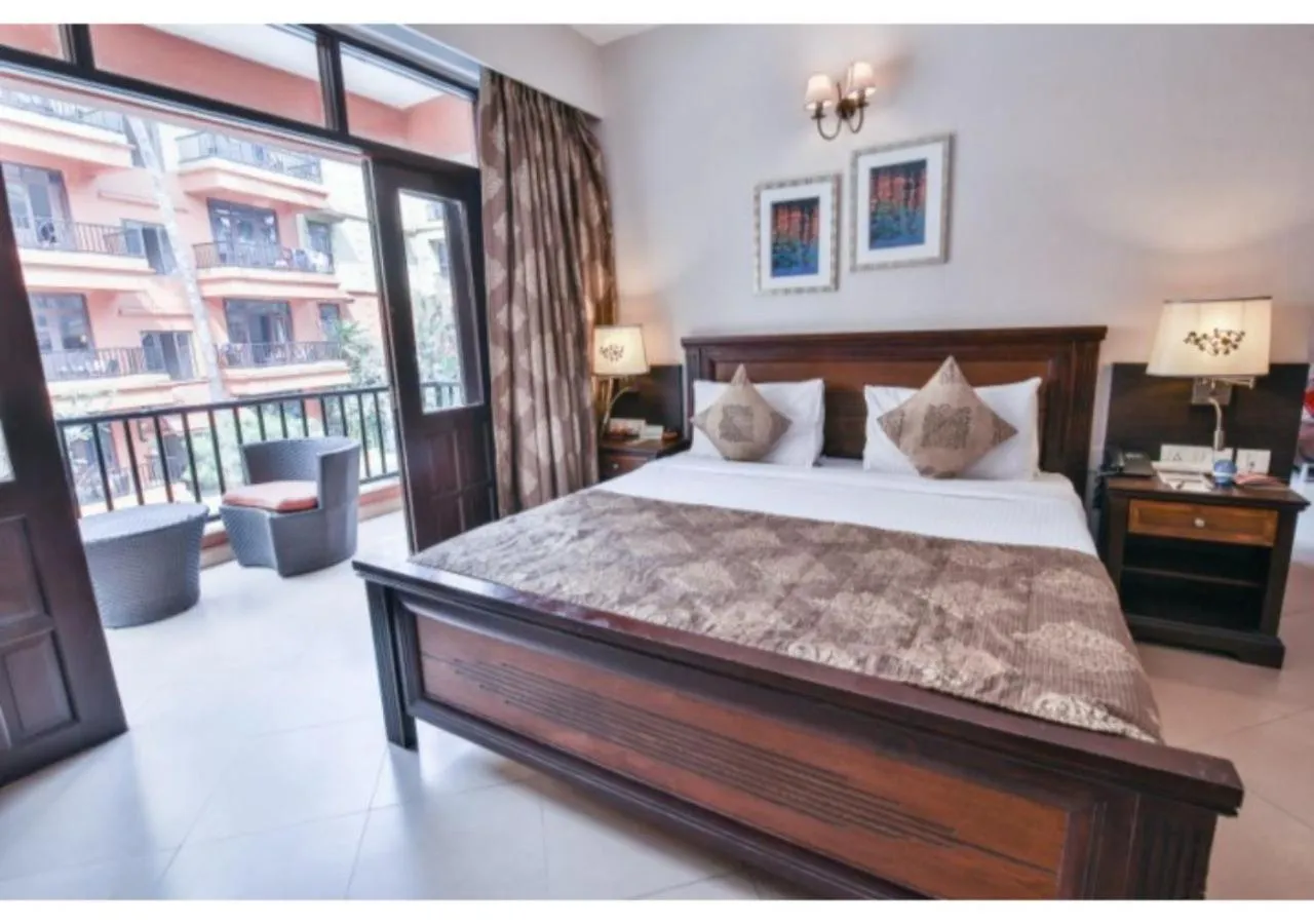 Bed in Neelam's The Grand Hotel Goa