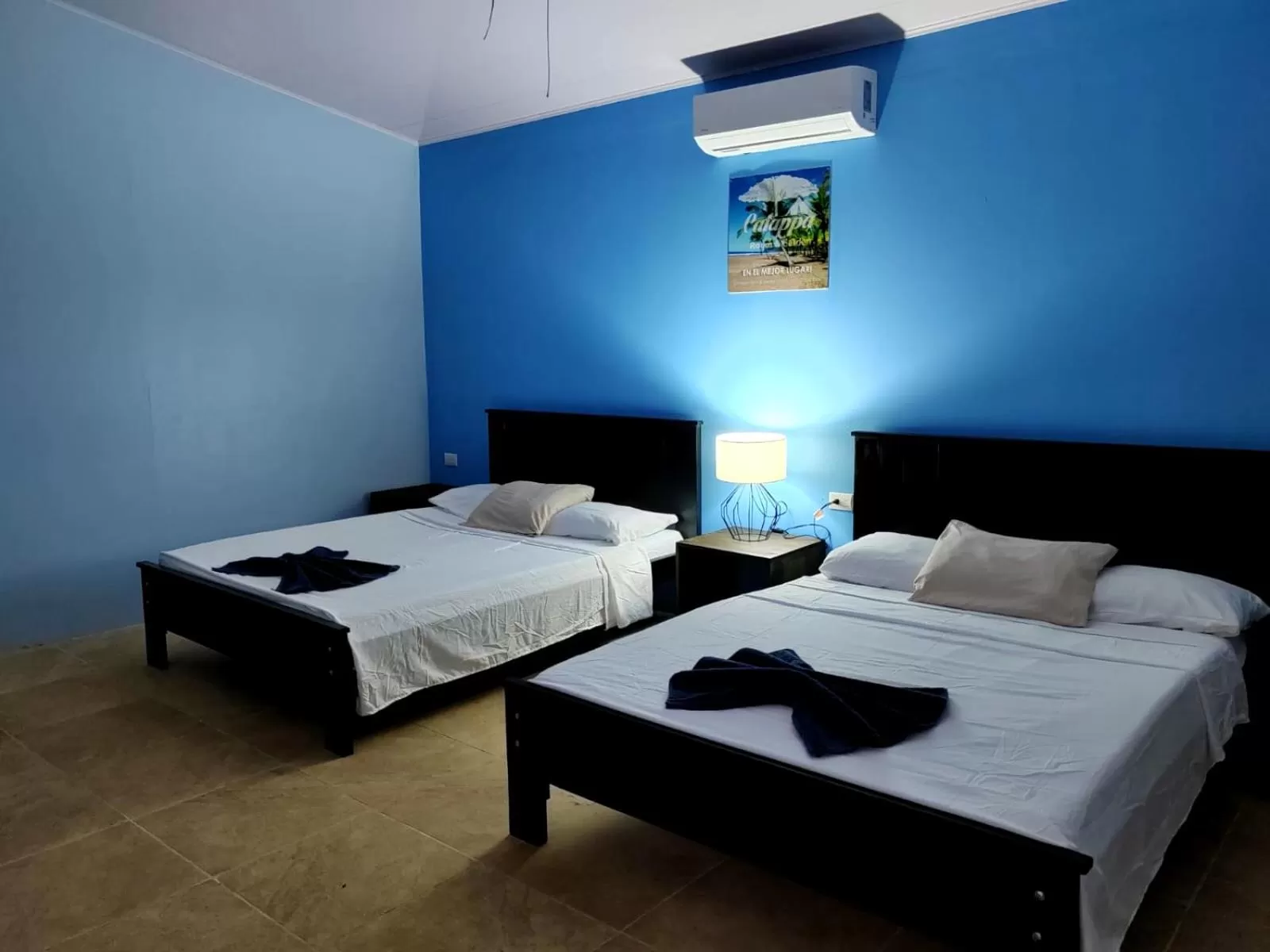 Property building, Bed in Hotel Catappa