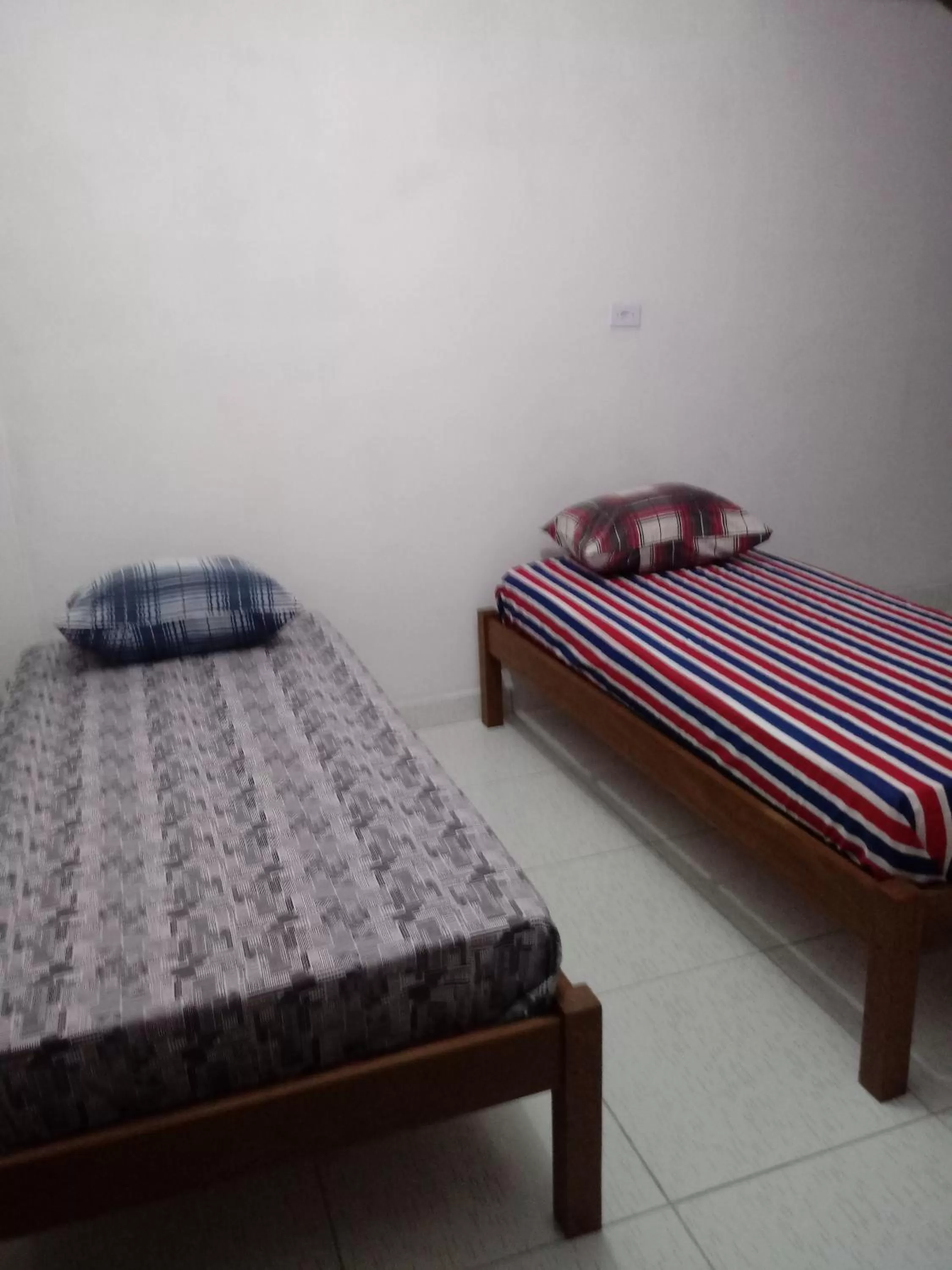 Bed in Pousada dos Ventos